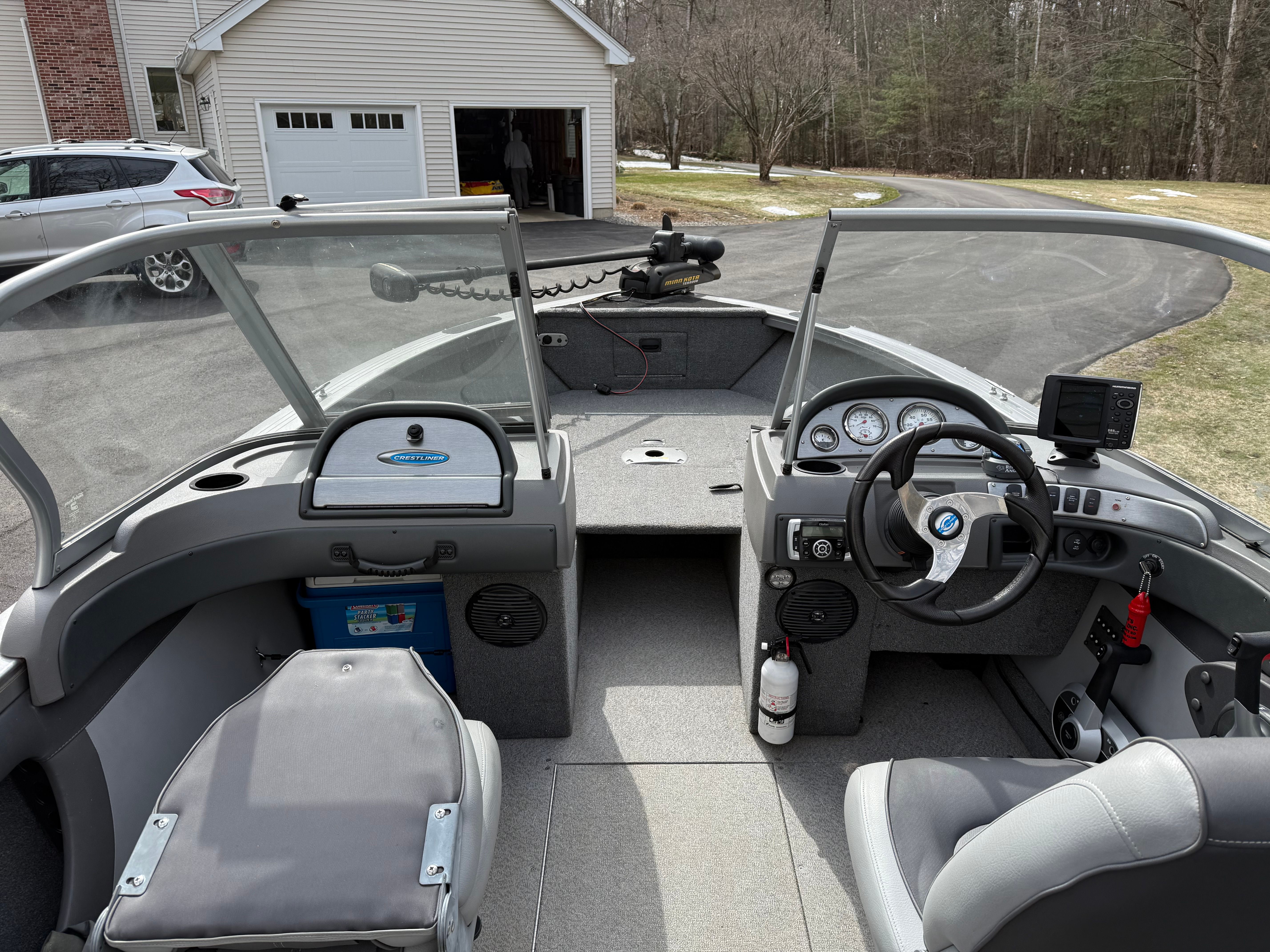 Interior of a 2015 Crestliner 1850 boat with steering console.