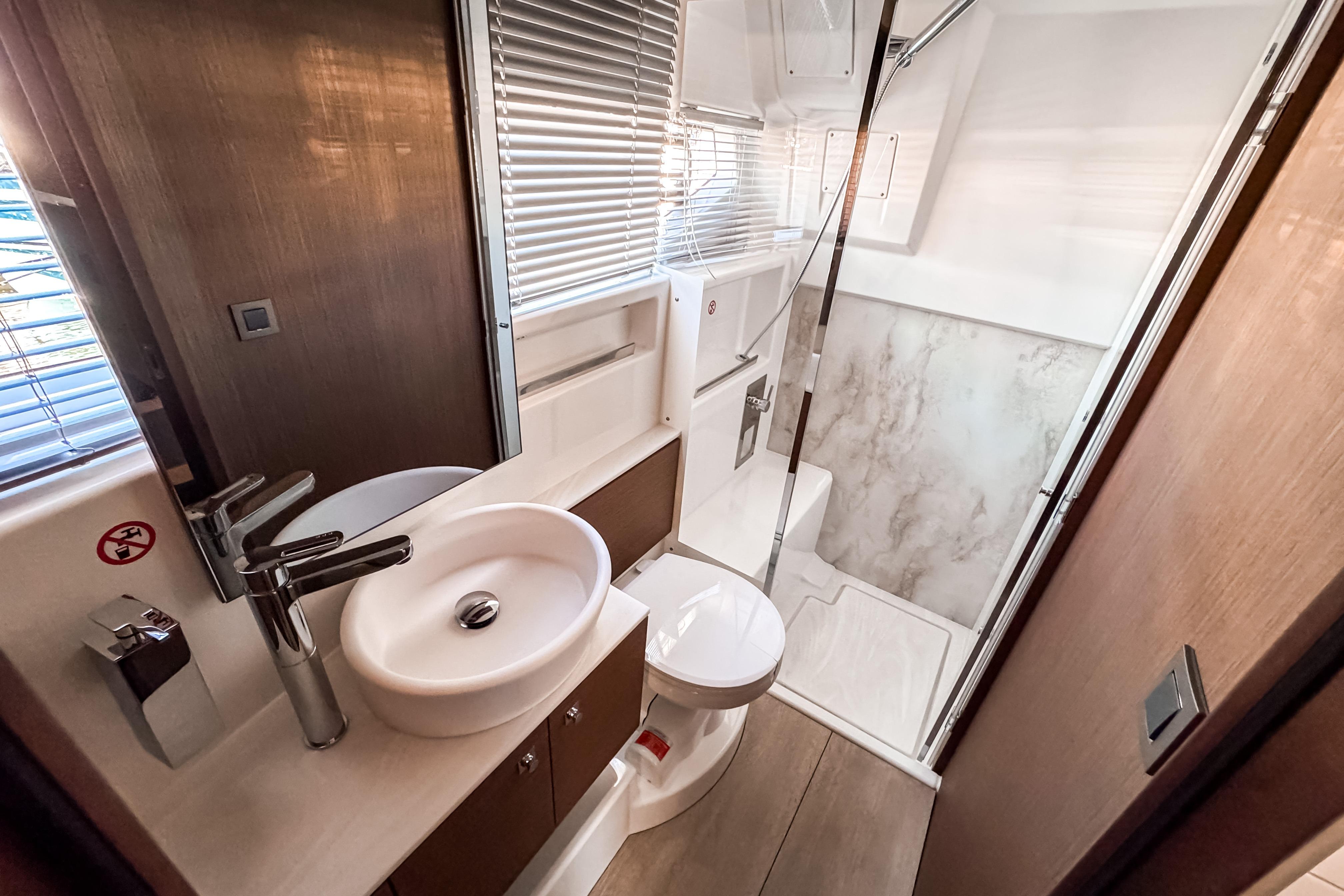 Modern bathroom in Wellcraft 44 Explorer 2026 yacht model.
