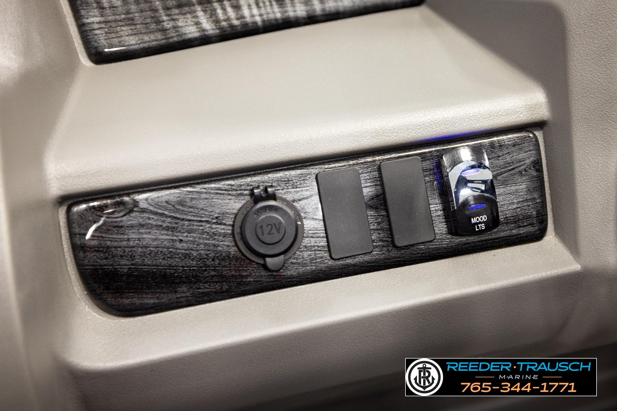 Control panel of 2026 Avalon LSZ QL with 12V outlet and mood lighting switch.