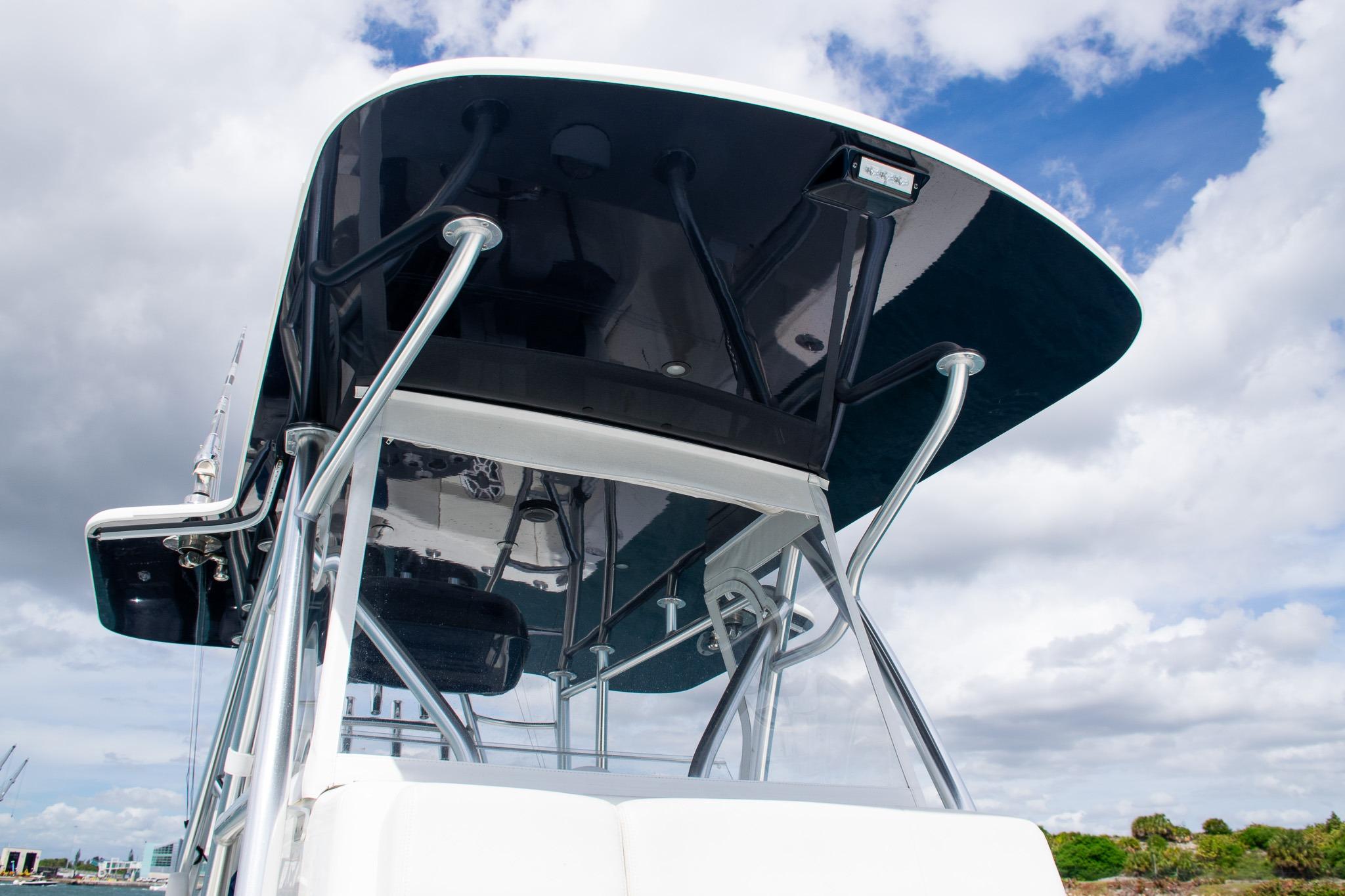 2022 SeaVee 390Z boat with sleek T-top design against cloudy sky.
