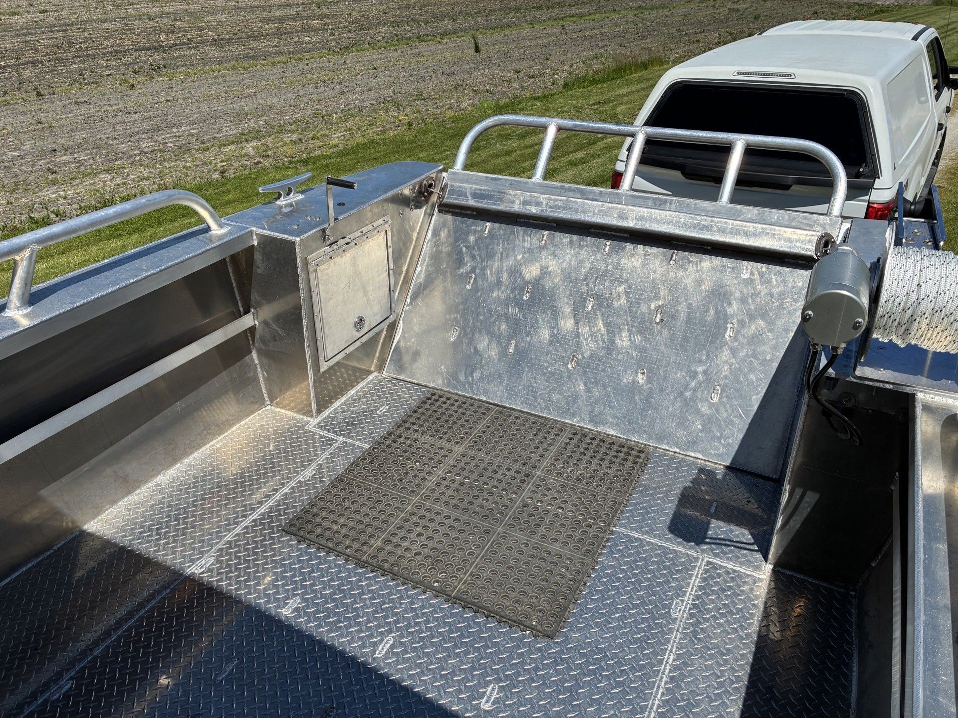 Custom Landing Craft 2026 with sturdy metal flooring and railing.