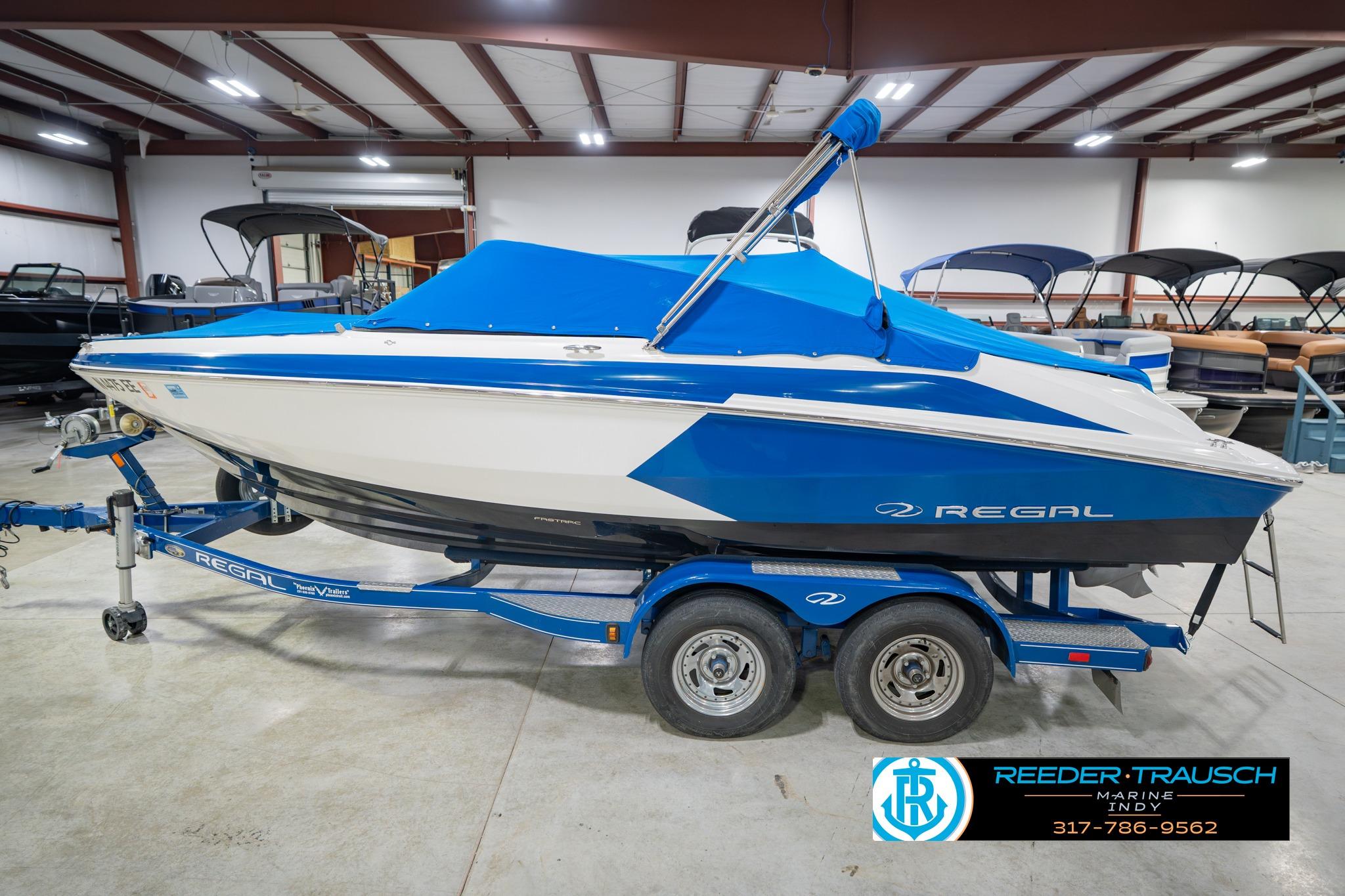 2015 Regal 2000 ESX Bowrider on trailer in indoor showroom.