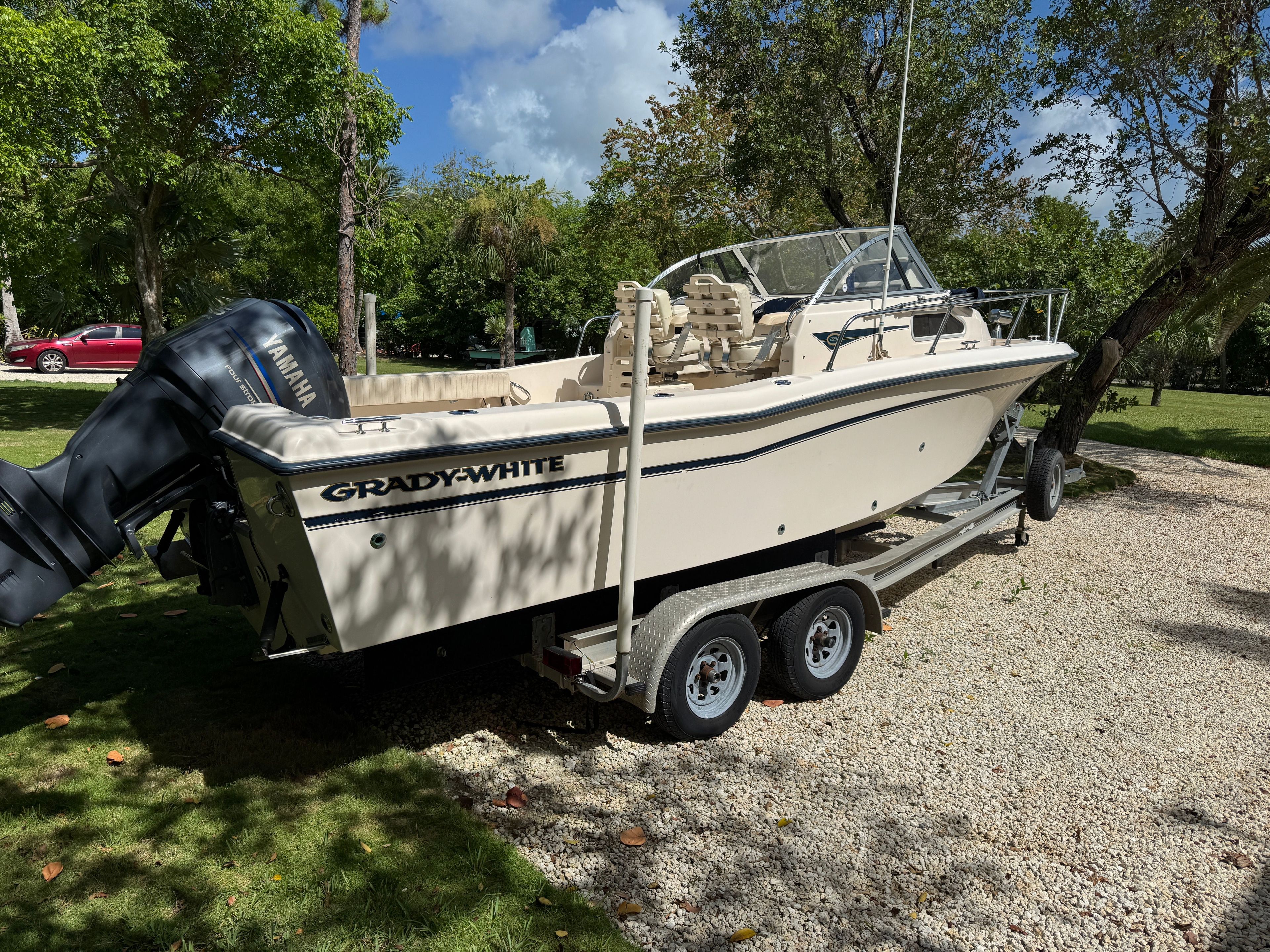 2005 Grady-White Seafarer 226 parked on a trailer outdoors.
