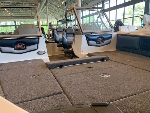 2024 Ranger 1850MS boat interior with seating and carpeted deck.