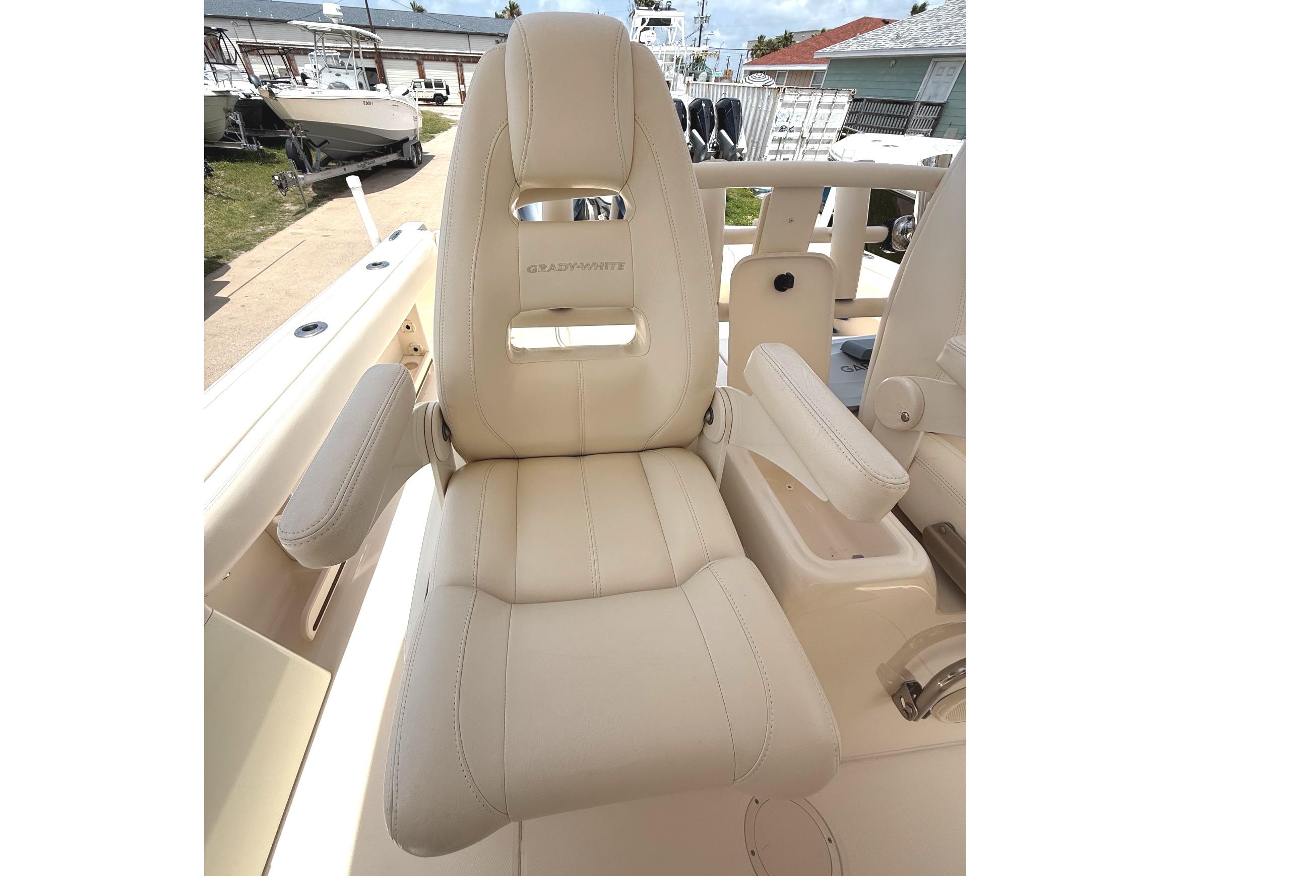 2018 Grady-White Canyon 306 boat seat with armrests, showcasing luxury and comfort.
