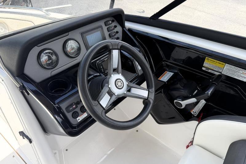 2017 Yamaha Boats SX210 dashboard with steering wheel and control panel.