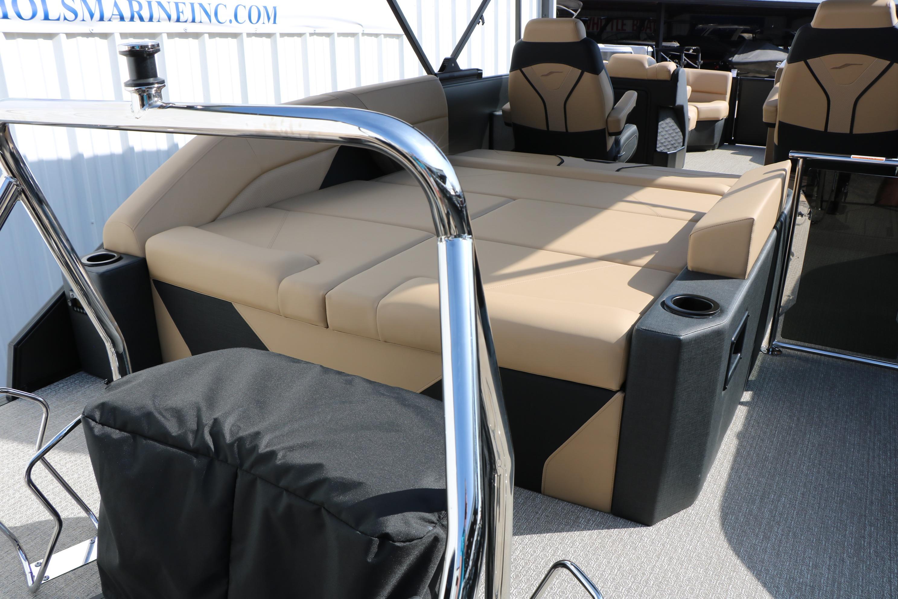2026 Evotti 723CS boat interior with beige seating and modern design.
