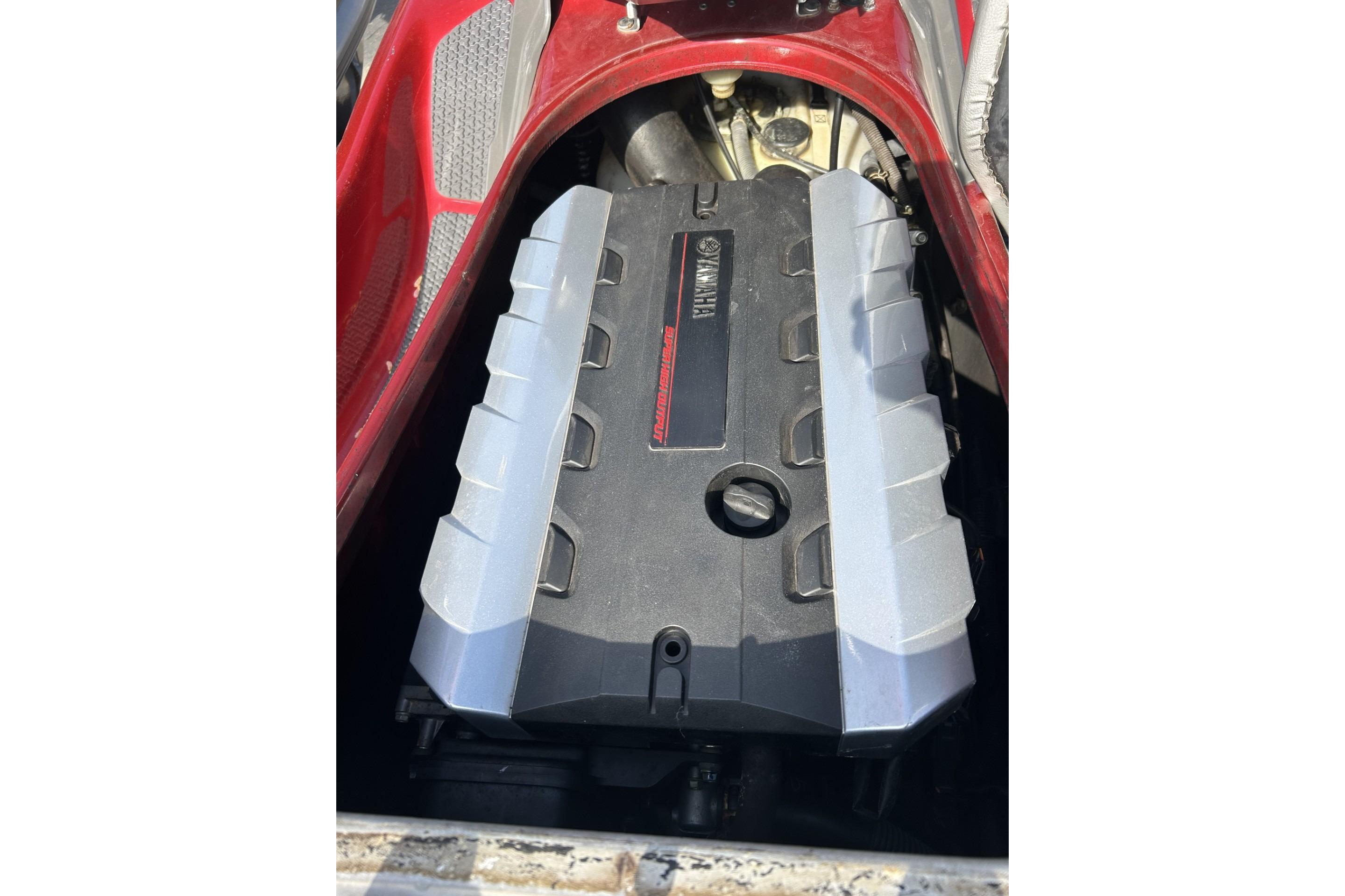 2011 Yamaha WaveRunner FZS engine compartment with visible components and red accents.