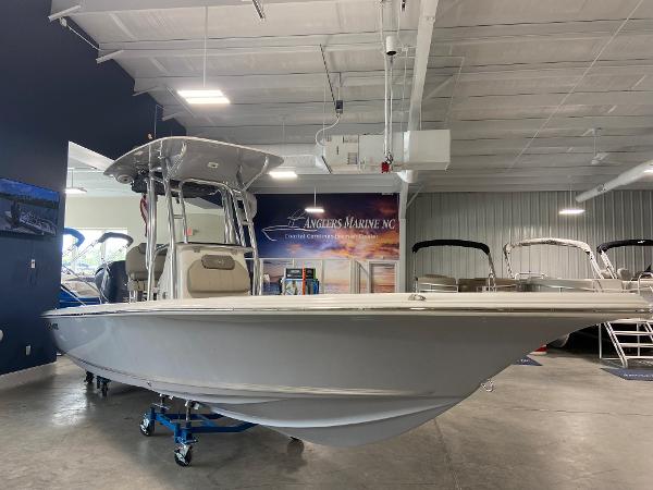2024 Key West 250 Bay Reef boat displayed in a showroom.