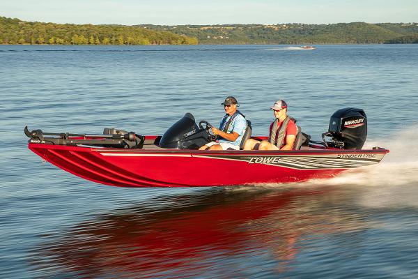 Manufacturer Provided Image: 2021 Lowe Stinger 175C boat cruising on a lake with two passengers.
