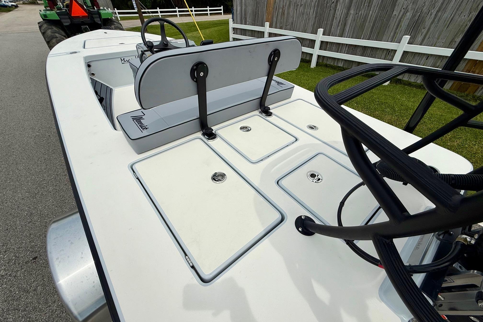 2026 Maverick 17 HPX-S boat deck with storage compartments and seating.