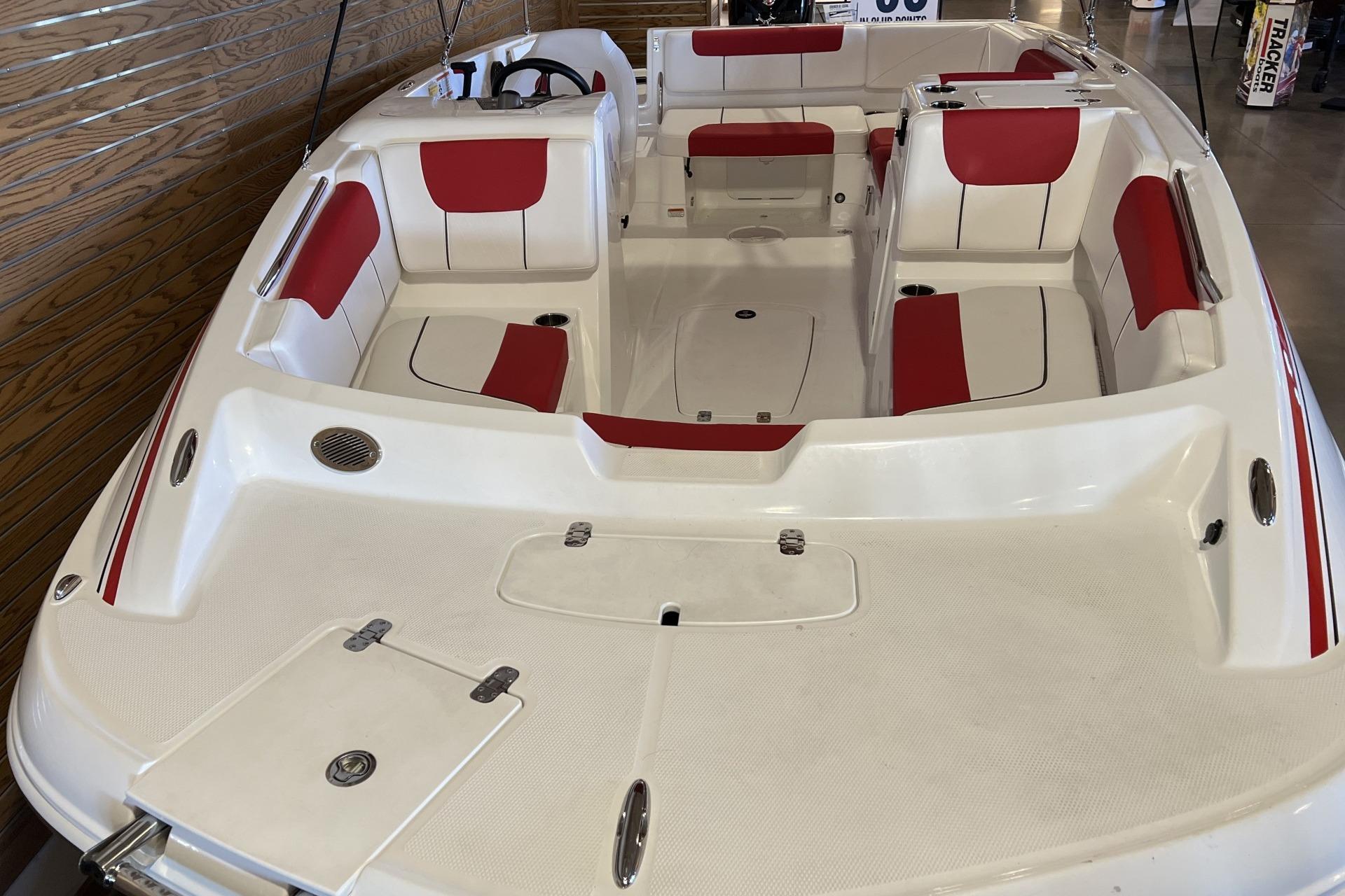 2025 Tahoe 1950 boat interior with red and white seating, spacious layout.