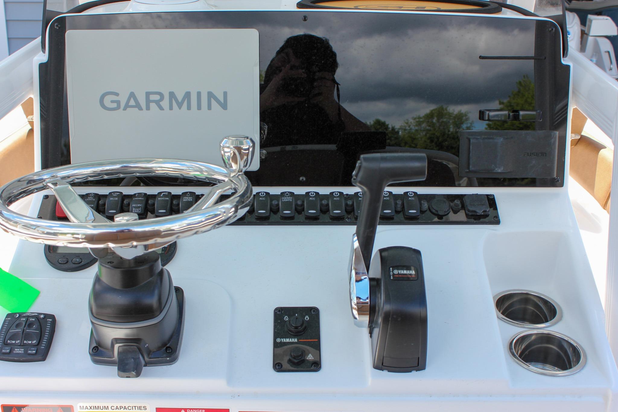 Control panel of 2027 Sea Hunt Ultra 234 boat with Garmin navigation system.