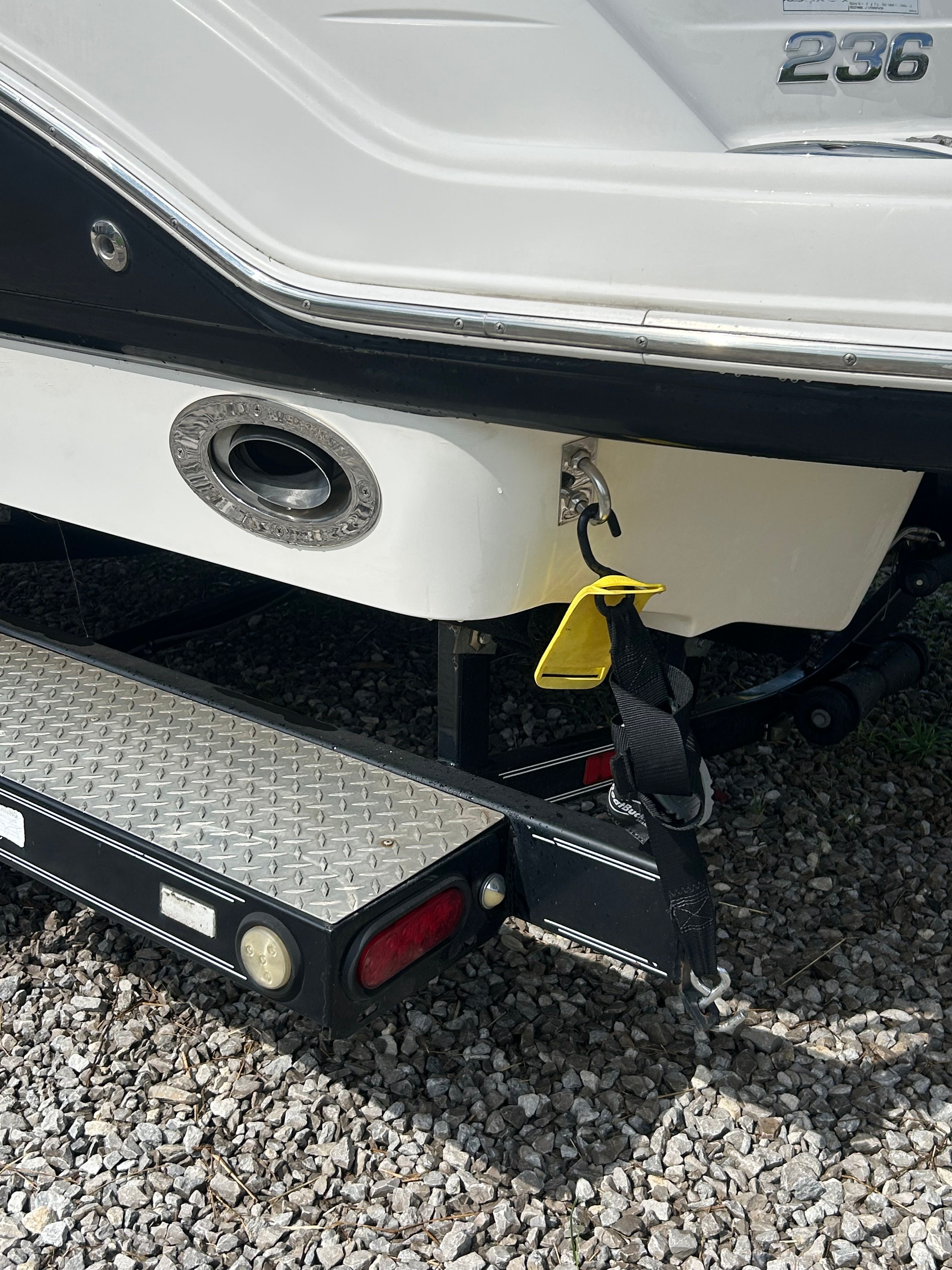 Rear view of a 2007 Chaparral 236 SSi boat on a trailer.