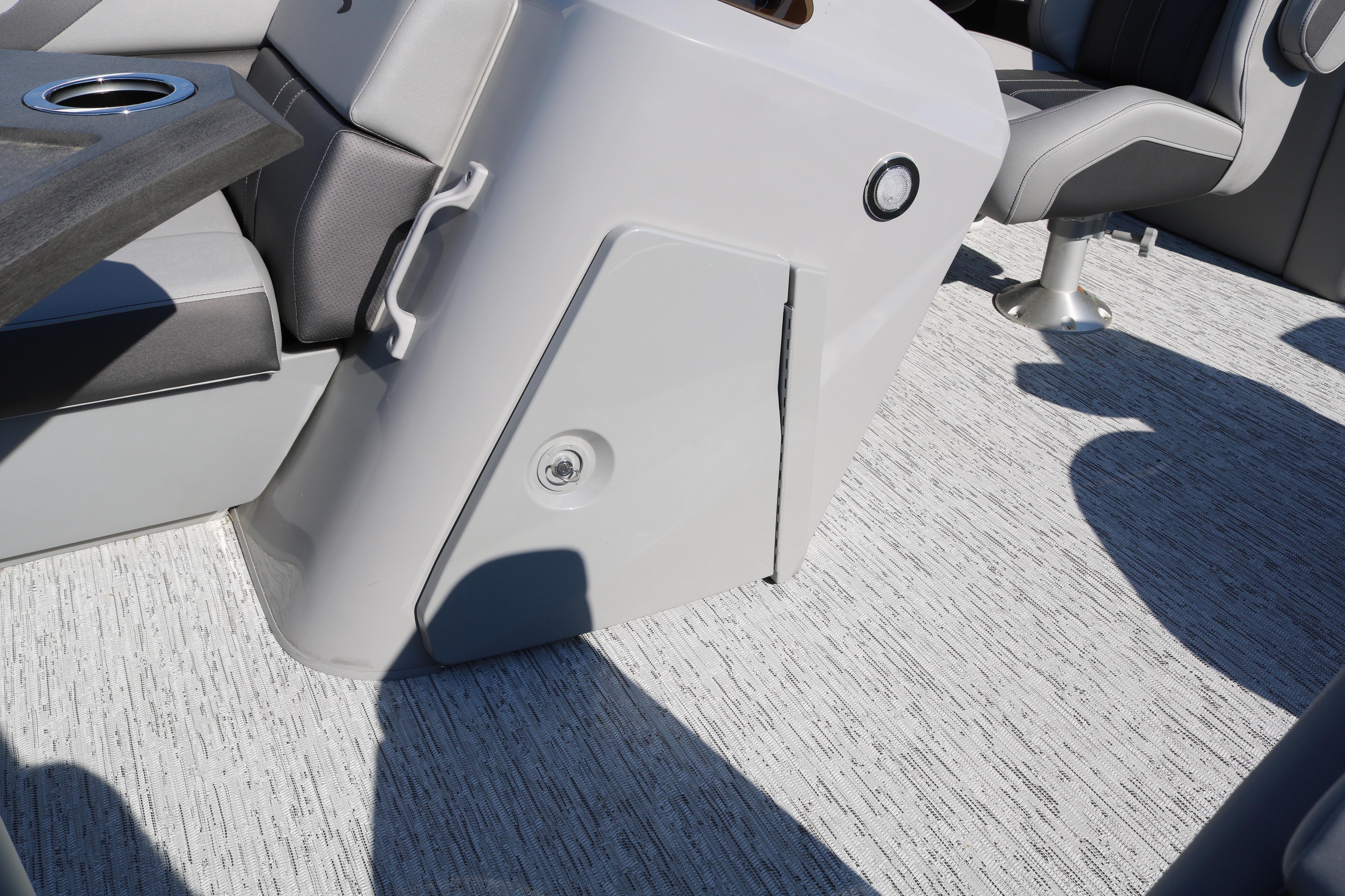 2026 Bennington 22SX Stern Radius interior with gray seating and flooring.