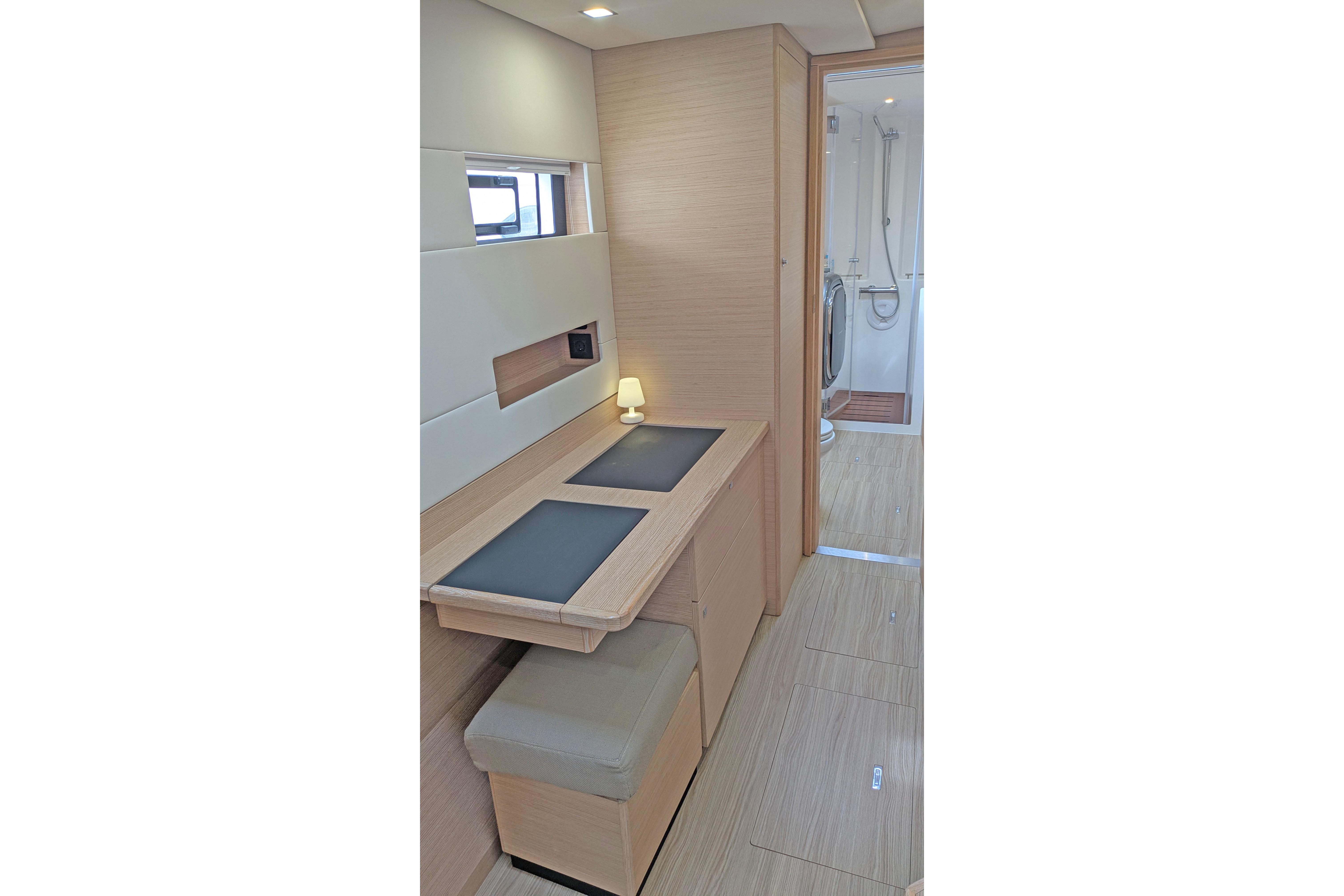 Modern interior of 2024 Nautitech 40 Open yacht with sleek design and compact workspace.
