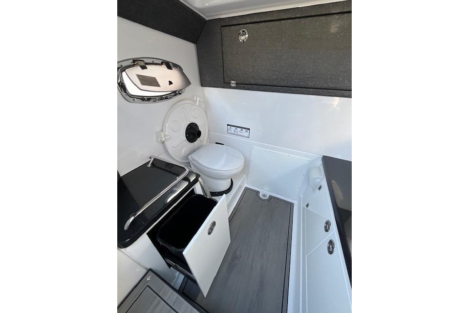 Interior of 2026 Monterey Elite 27 SD boat bathroom with modern amenities.