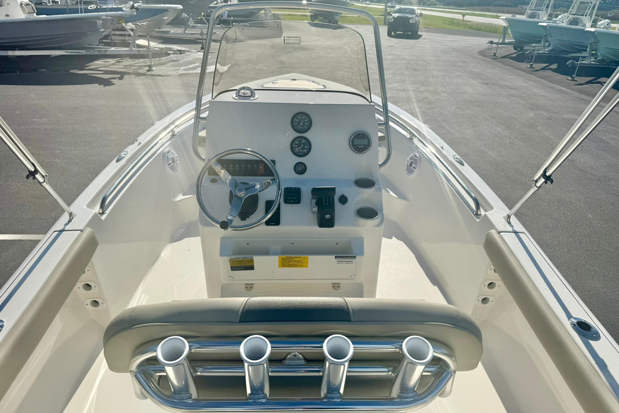 2026 Key West 189 FS boat interior with steering wheel and control panel.