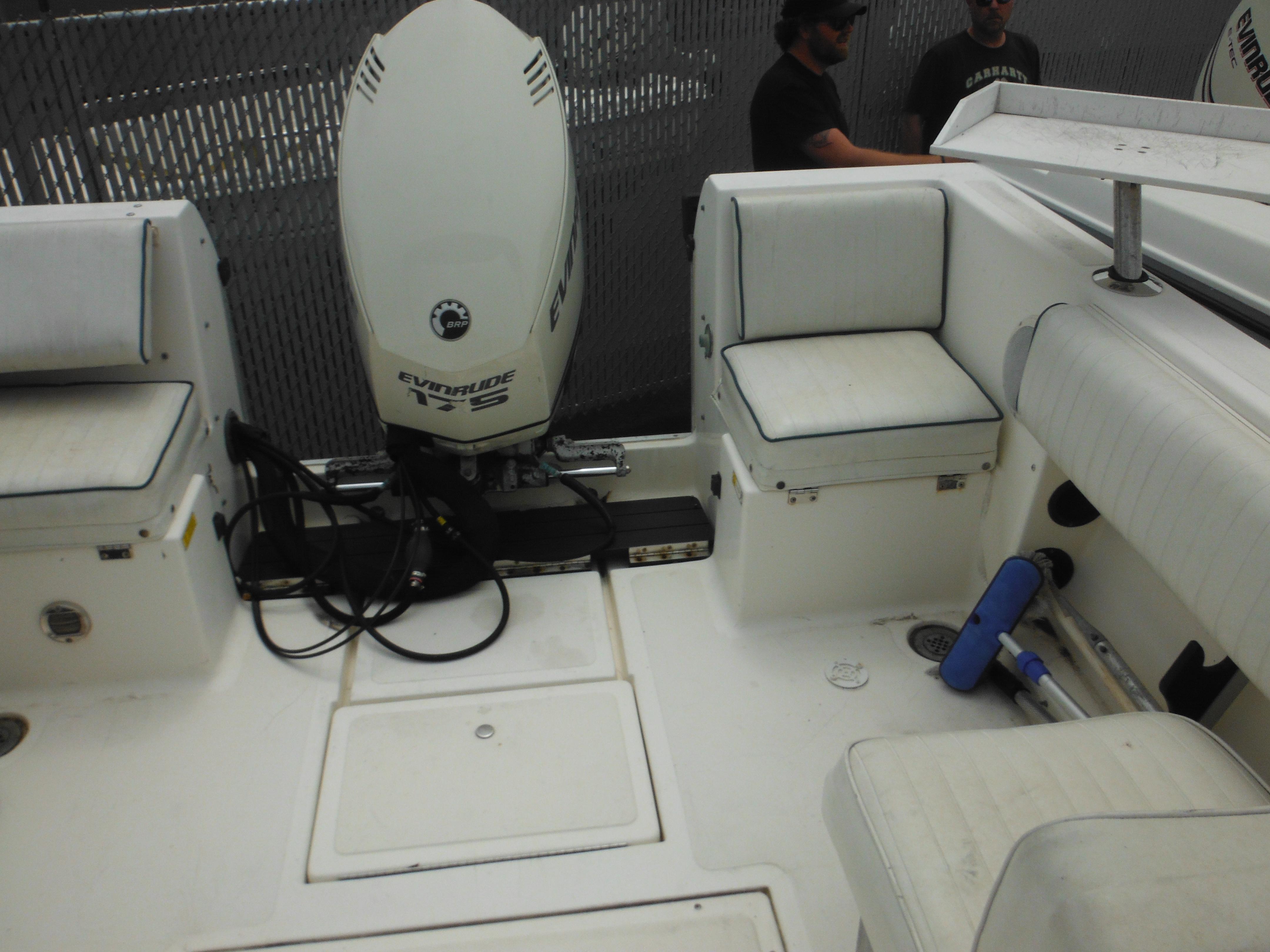 1996 Hydra-Sports 2000 DC boat interior with Evinrude 175 motor and white seating.