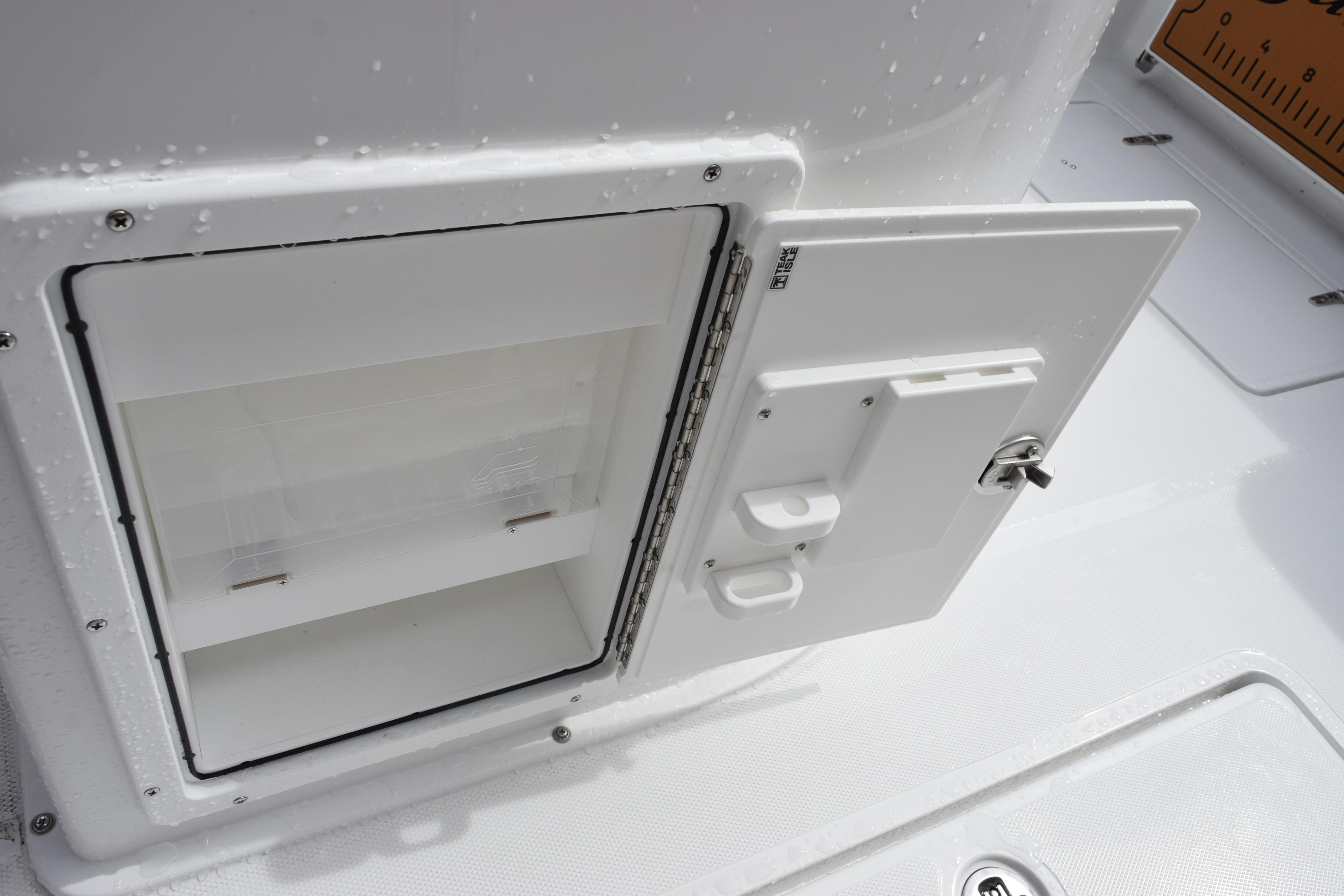 Open storage compartment on 2027 Sea Hunt Gamefish 27 Coffin Box boat.