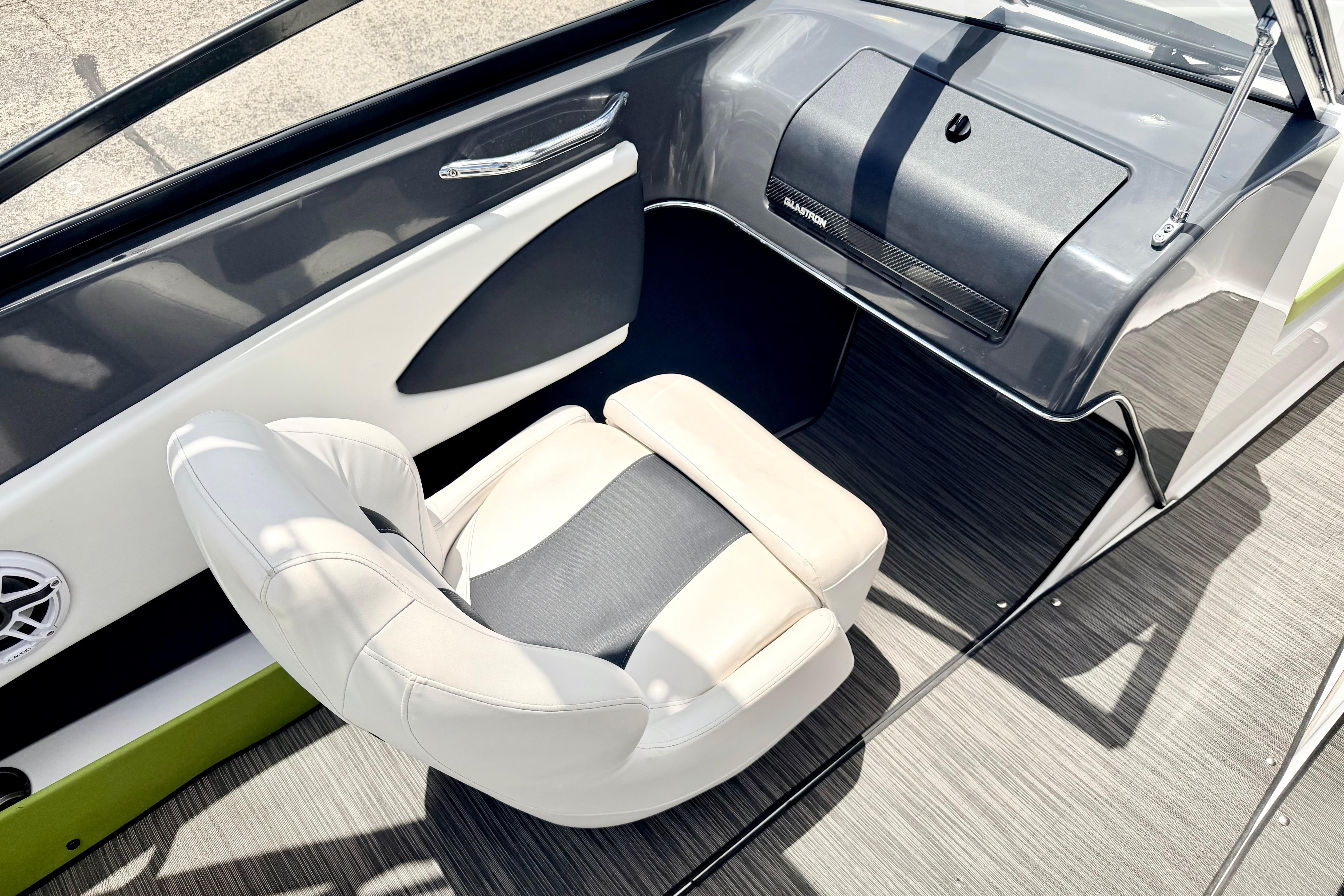 2018 Glastron GT 185 boat interior with sleek seating and modern dashboard design.