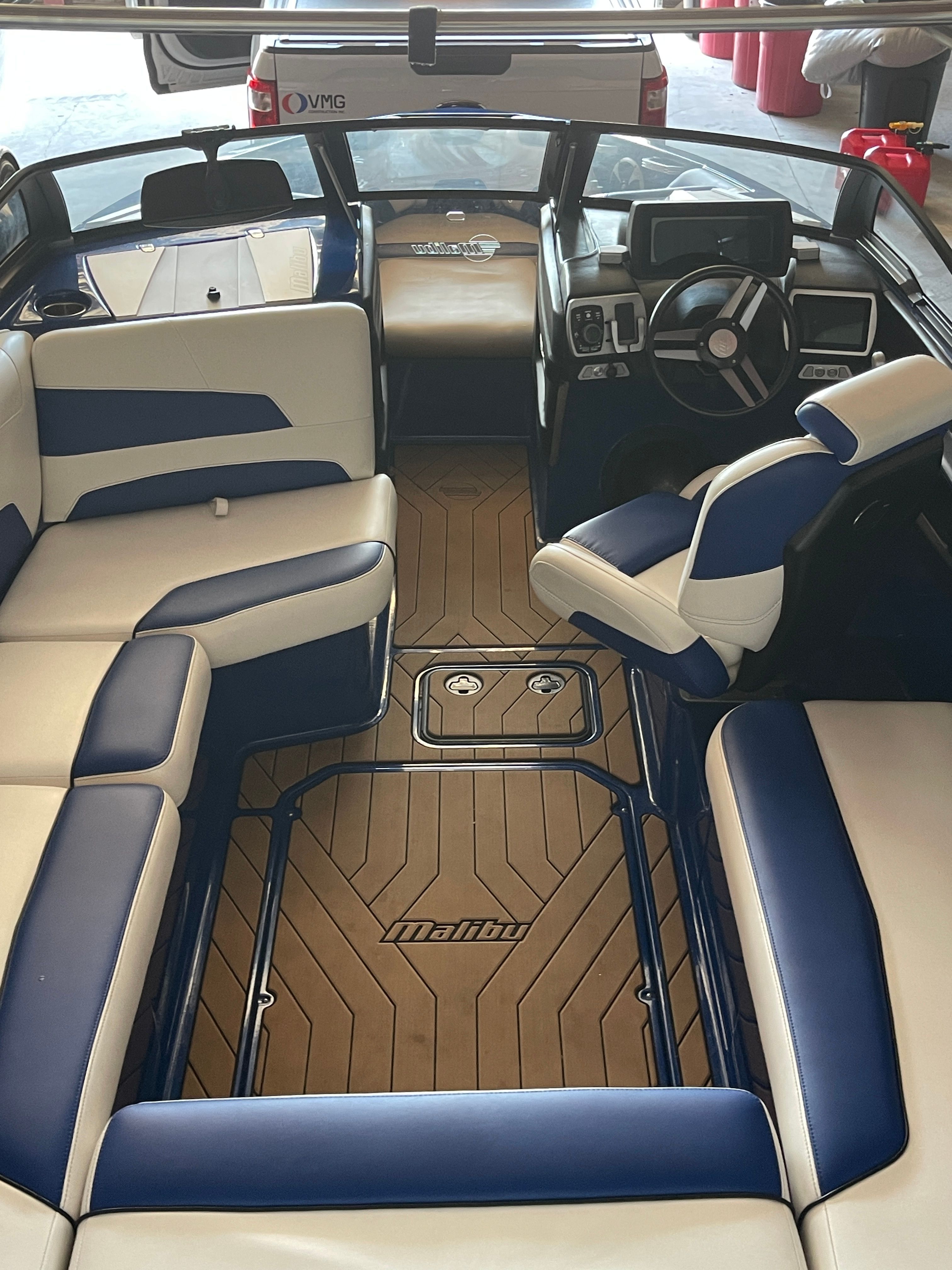 Interior of a 2019 Malibu Wakesetter 22 LSV with blue and white seating.