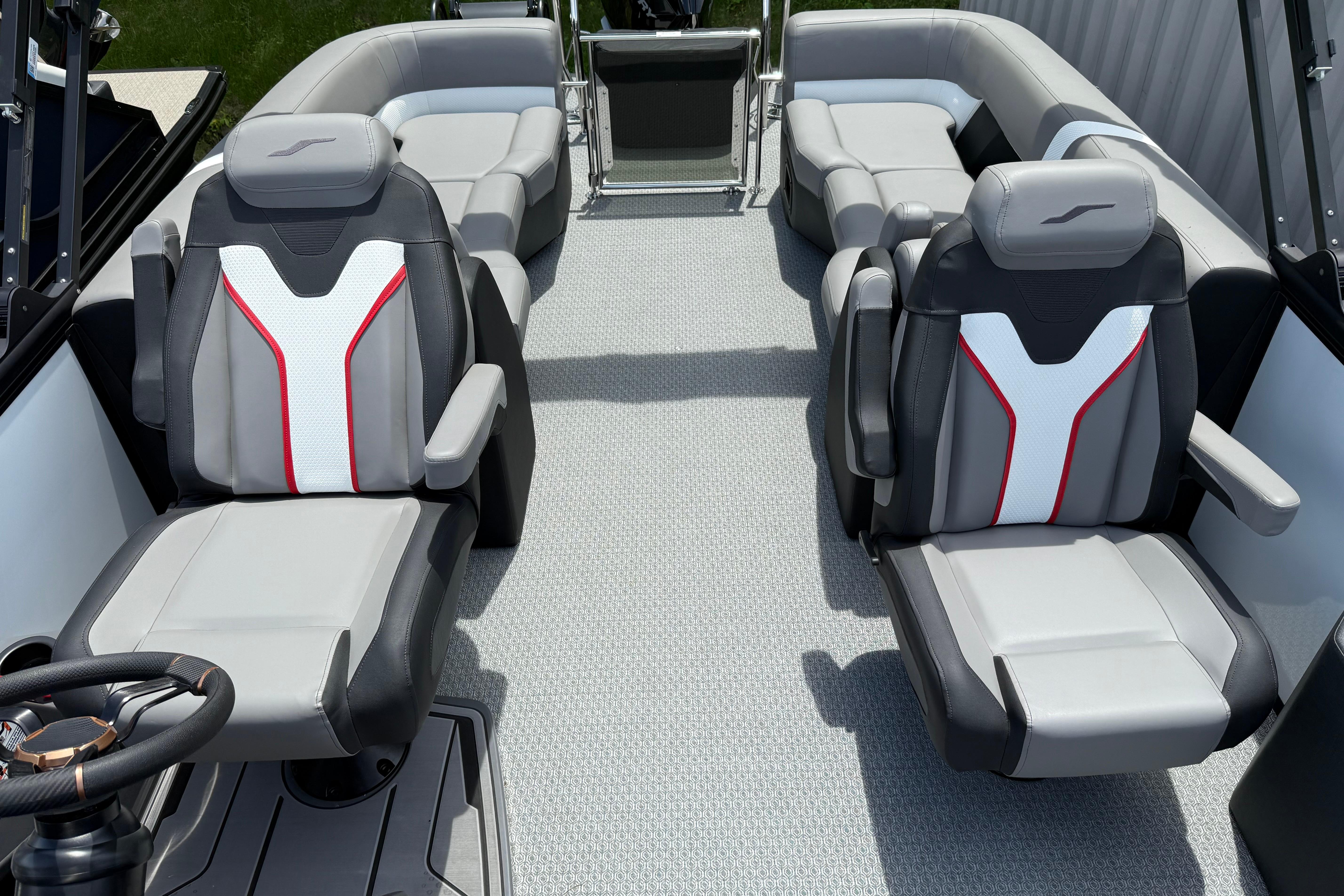 Luxury seating on 2026 Evotti 723QL boat, featuring modern design and comfortable upholstery.
