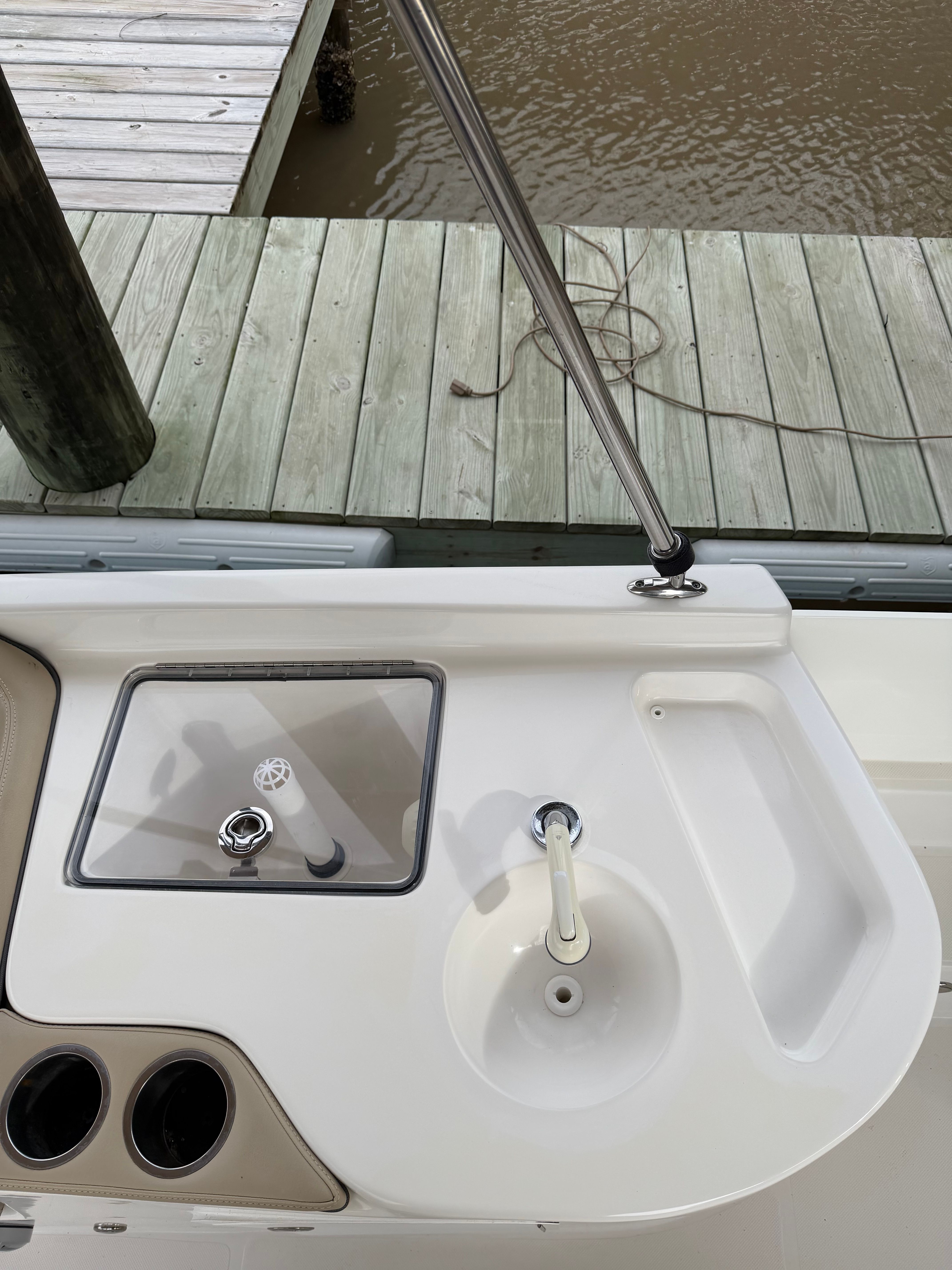 Sea Pro Citation 2021 boat console with sink and cup holders.