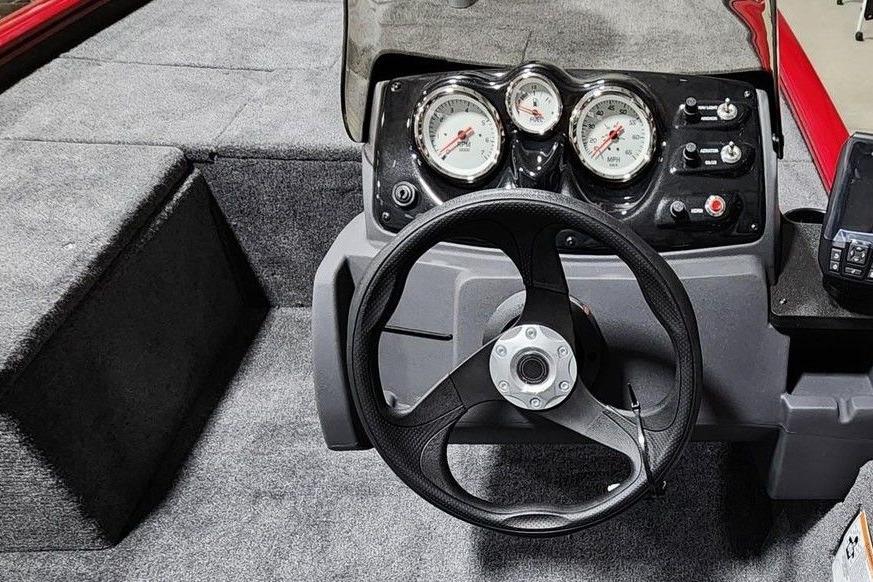 Steering console of 2026 Tracker Pro 170 boat with gauges and controls.