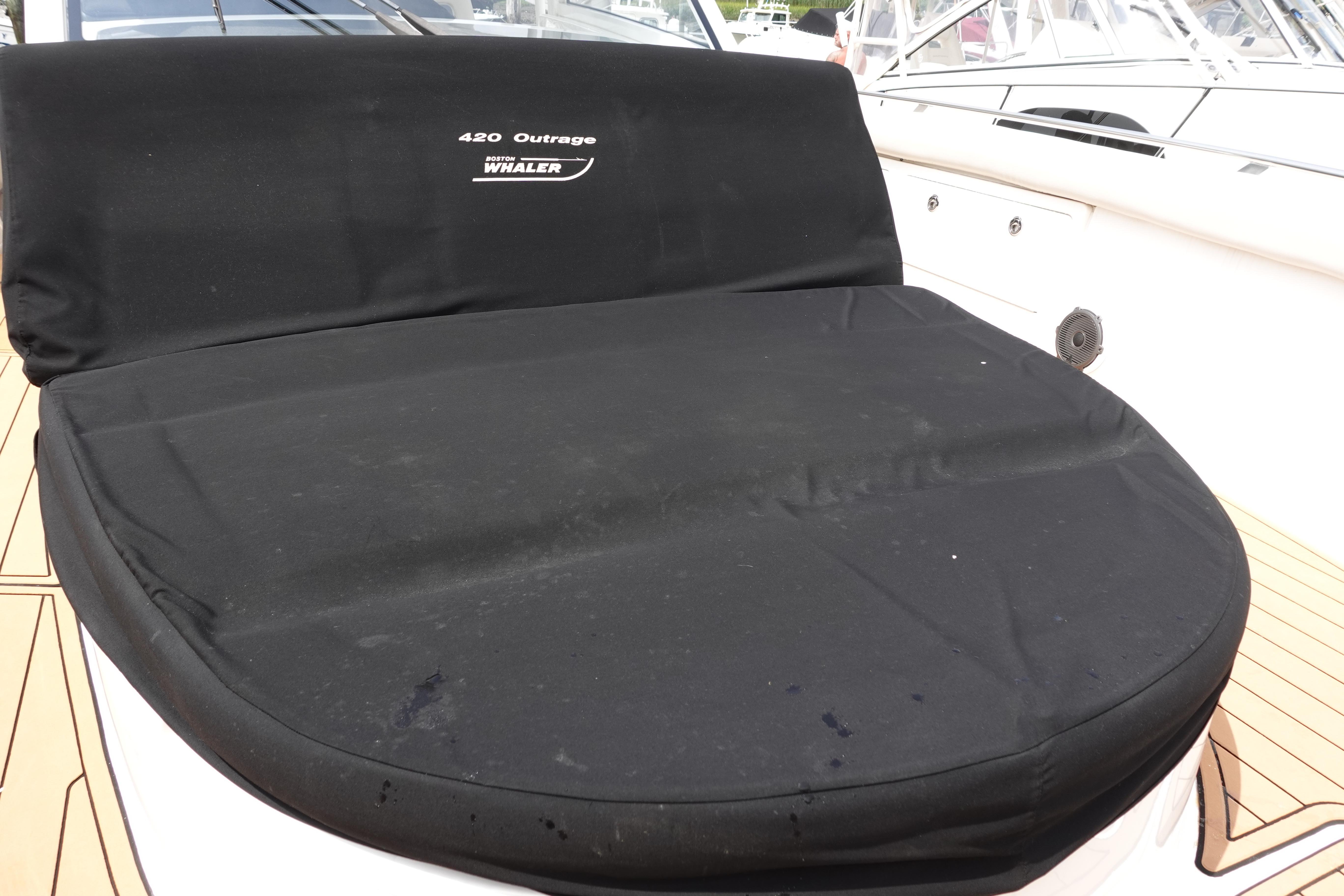 Boston Whaler 420 Outrage 2020 boat seat with black cover on deck.