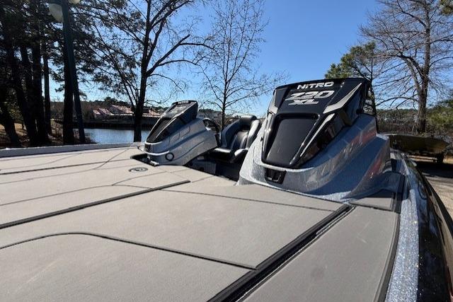 2026 Nitro Z20 XL Pro boat with sleek design near a serene lake.