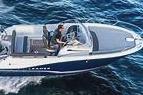 2026 Jeanneau Leader 6.5 boat cruising on open water, side view.