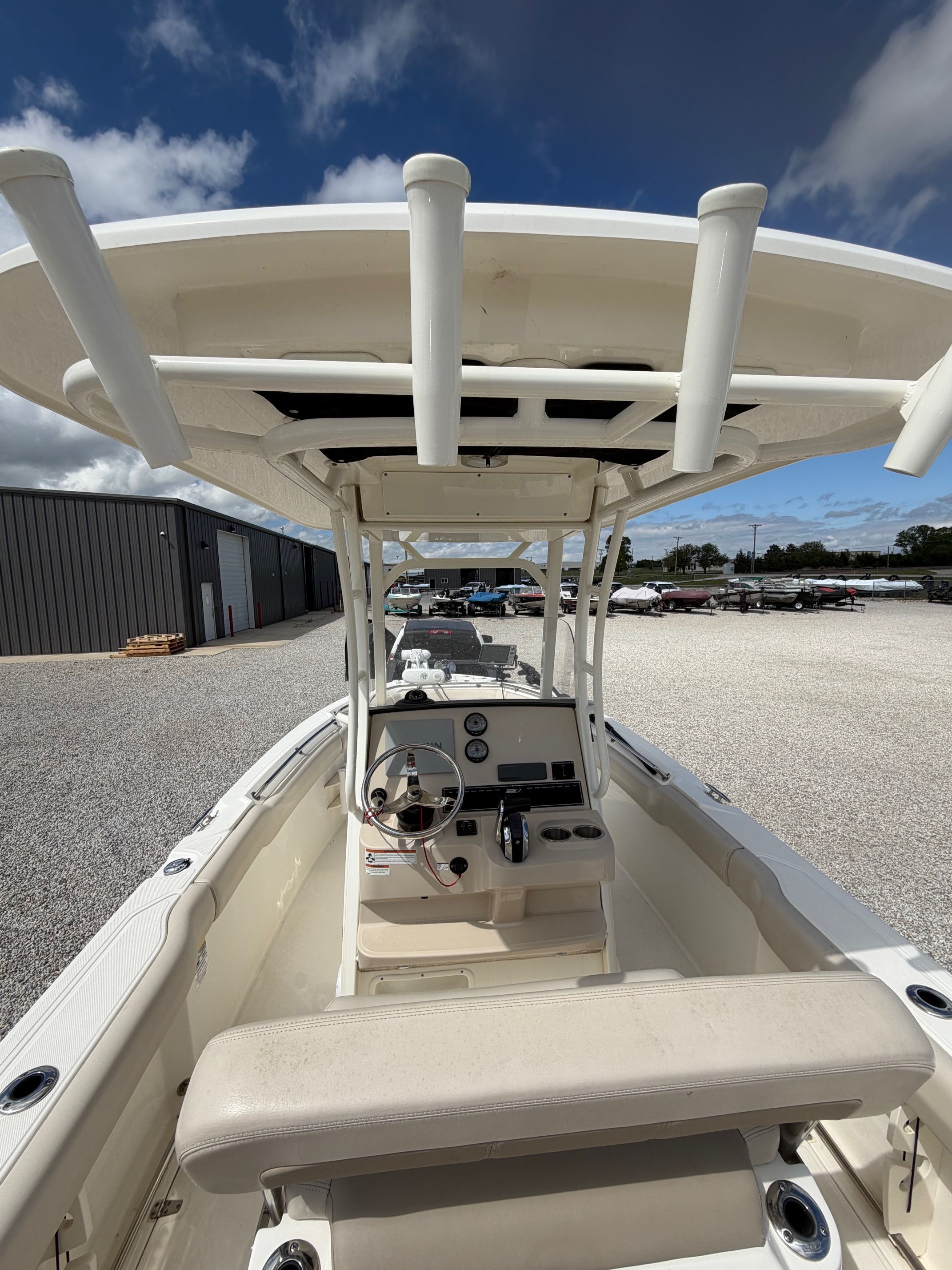 2020 Boston Whaler 230 Outrage interior view on gravel lot.