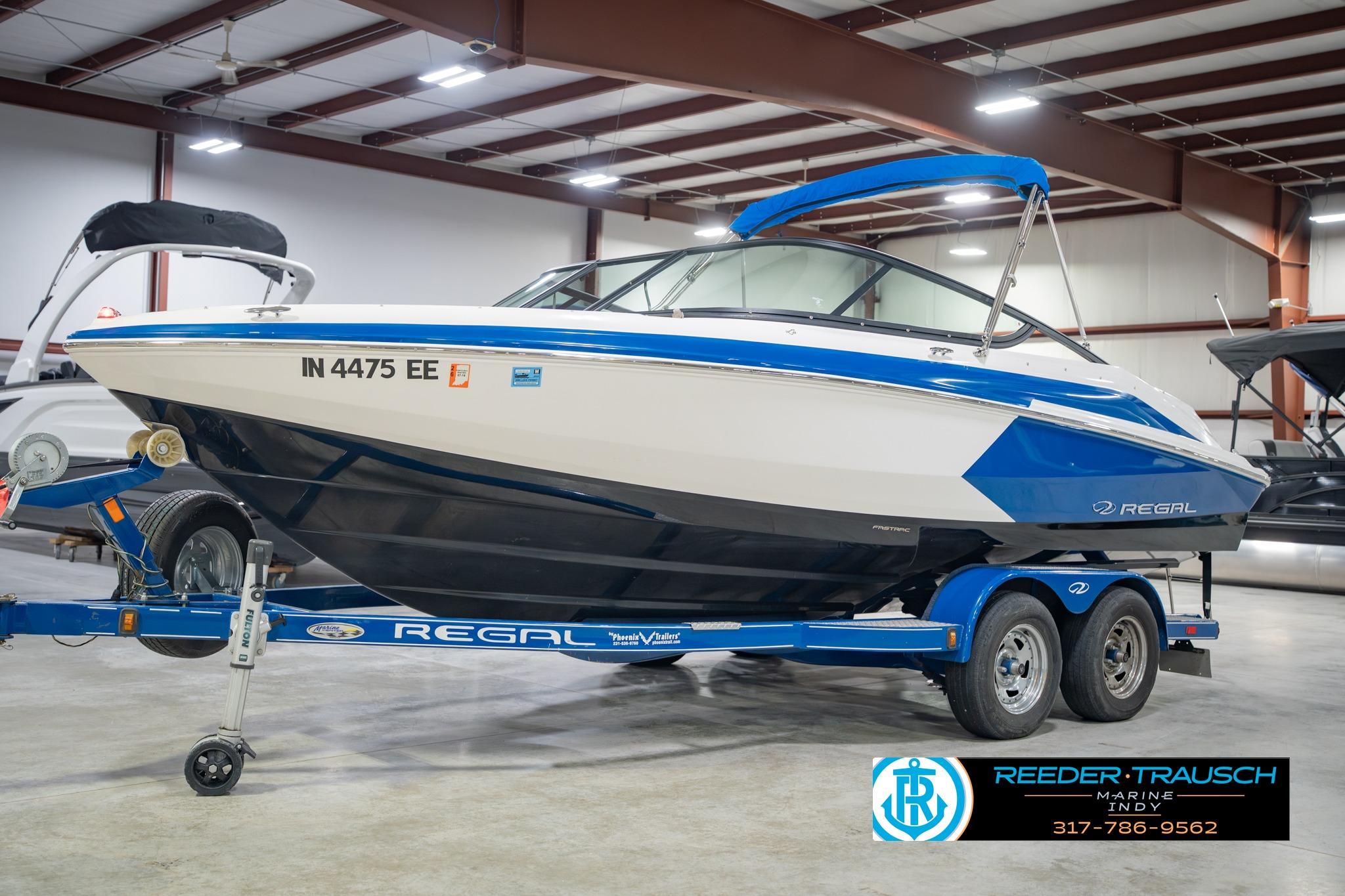 2015 Regal 2000 ESX Bowrider on trailer in indoor showroom.