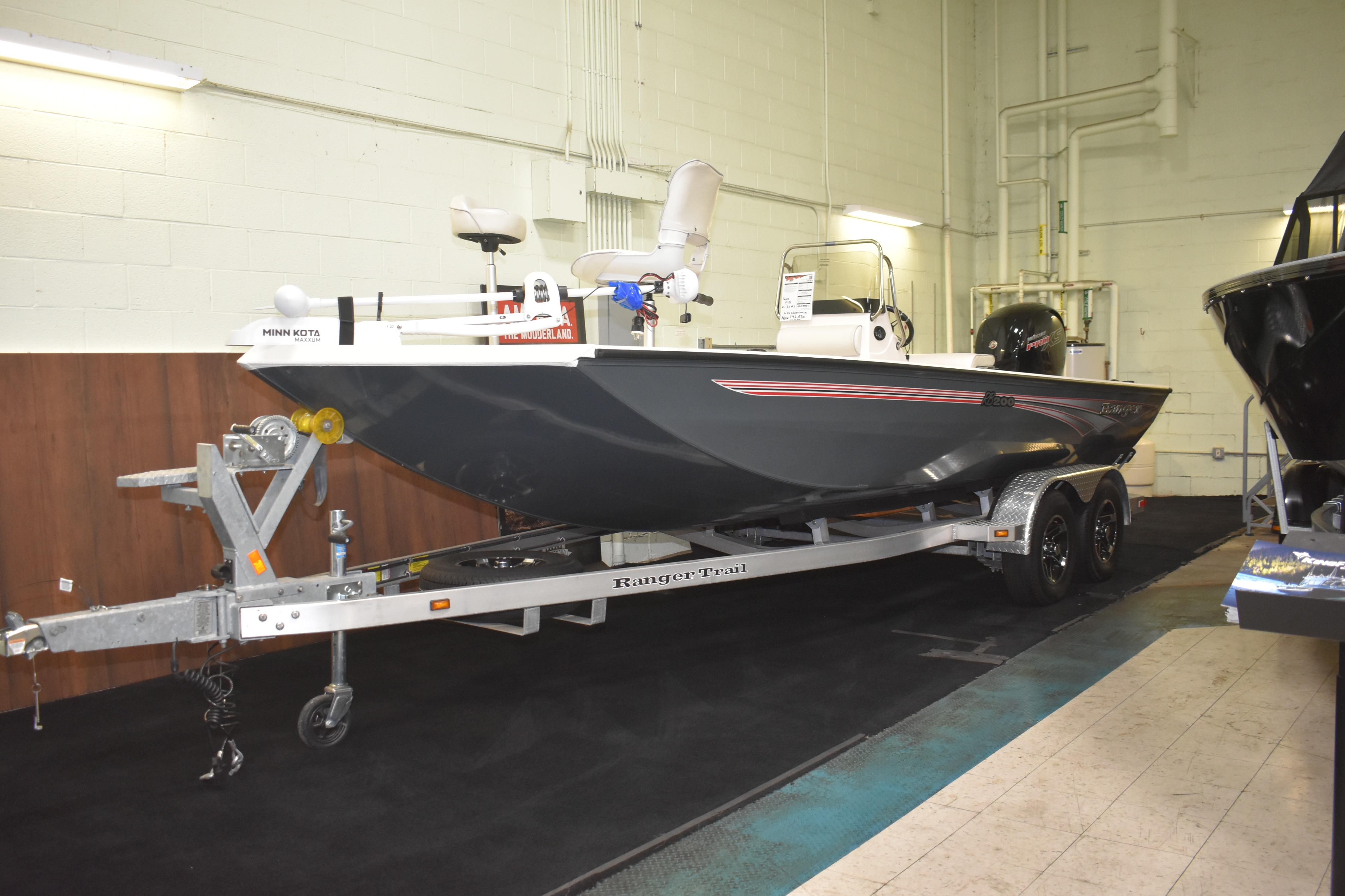 2024 Ranger RB200 boat on trailer in indoor showroom setting.