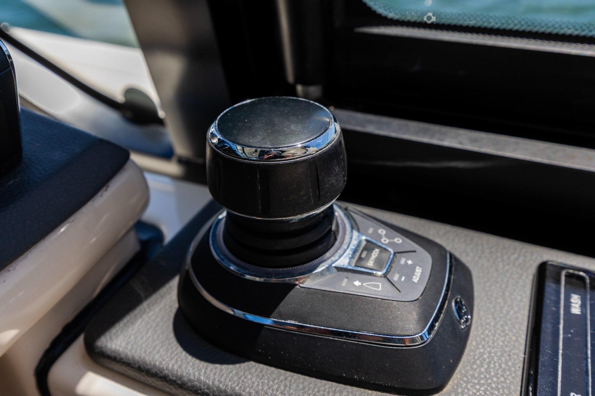 Joystick control on 2023 Boston Whaler 405 Conquest boat dashboard.