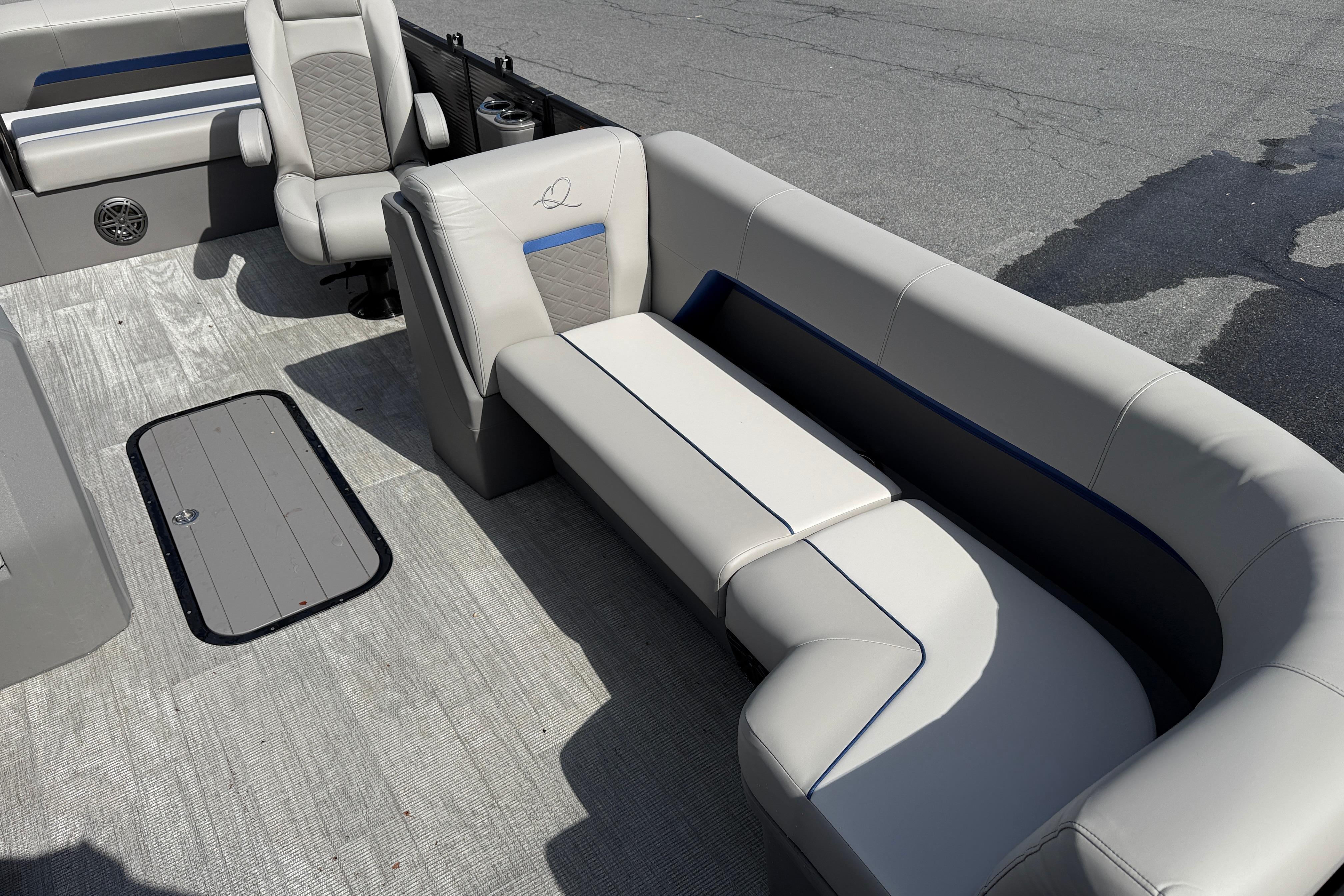 Interior of 2025 Qwest SplashPad 22 Performance TriToon with luxurious seating.