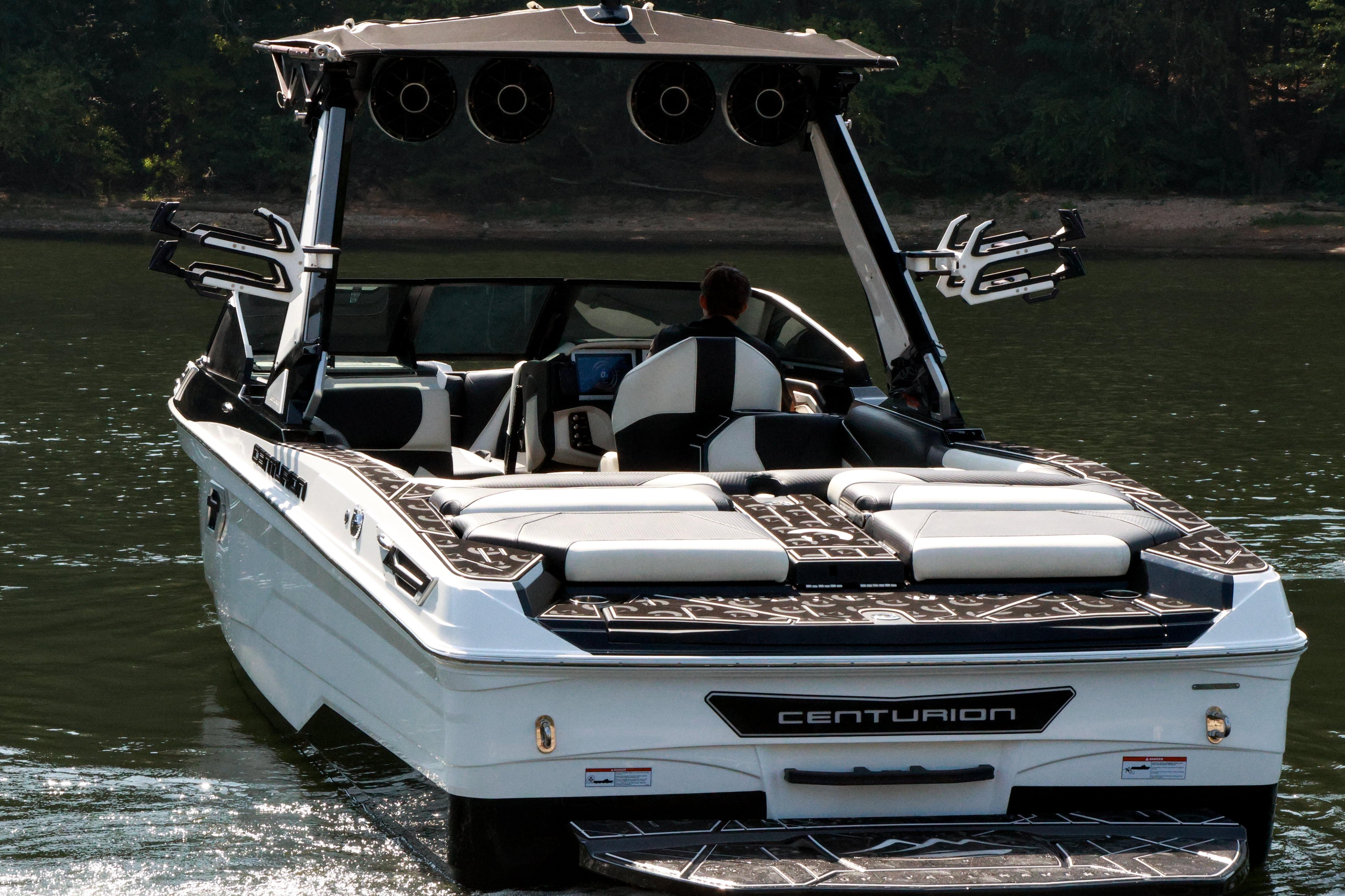 2022 Centurion Ri265 boat on water, featuring sleek design and modern amenities.