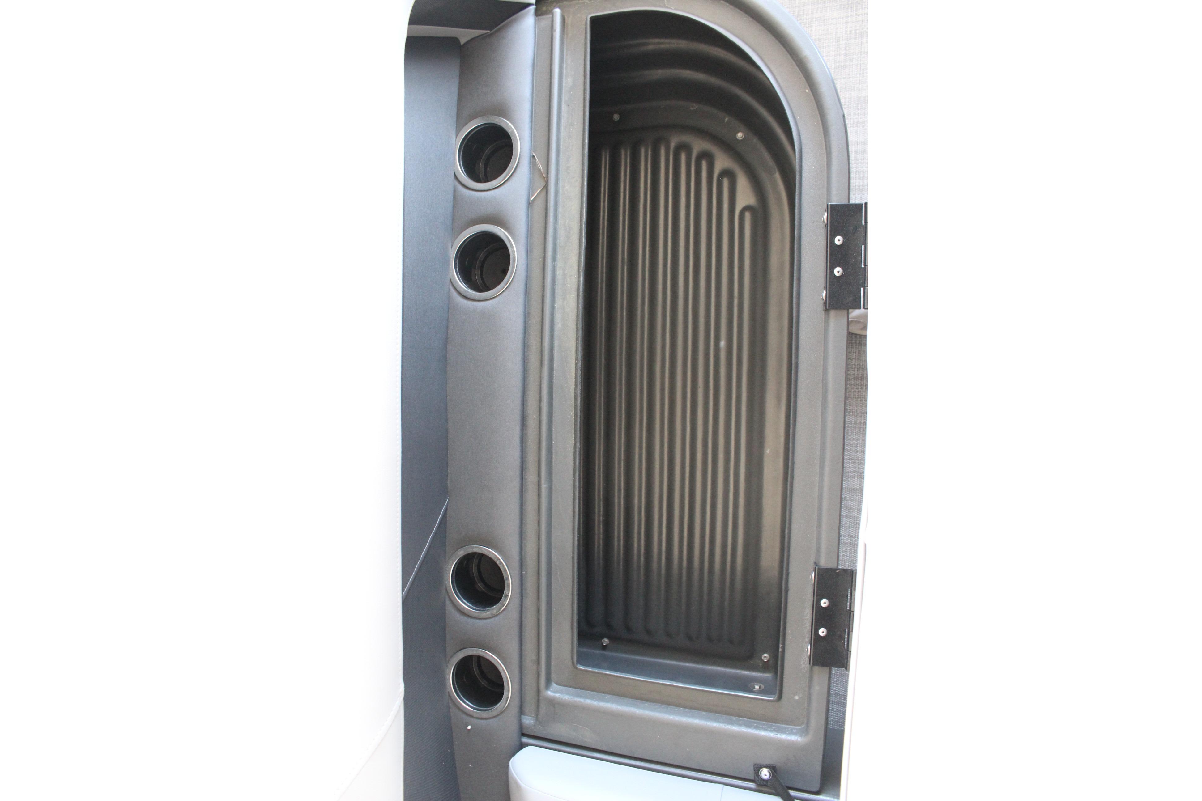 2026 Sun Tracker Party Barge 16 DLX storage compartment with cup holders.