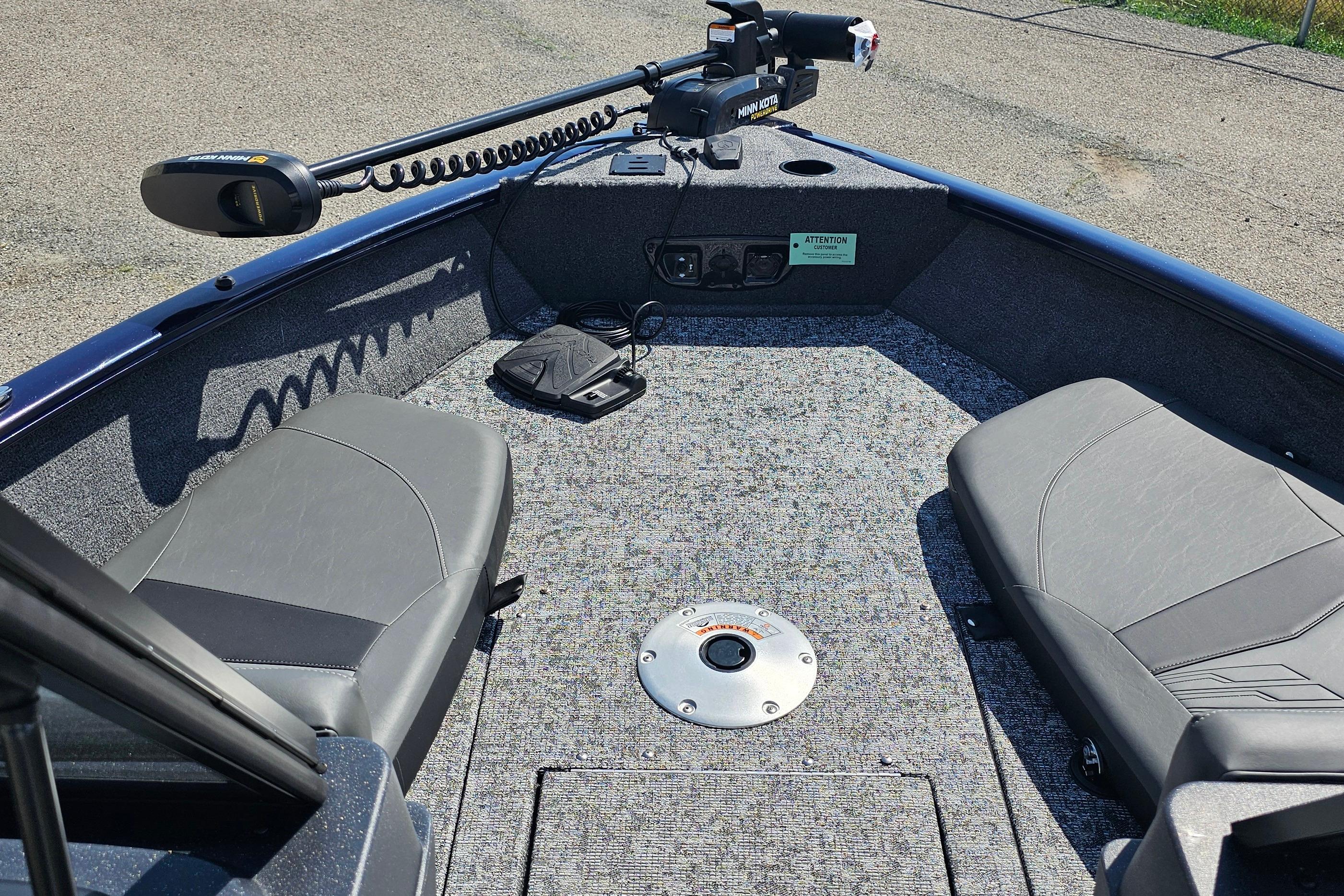2026 Tracker Pro Guide V-175 Combo boat interior with seating and trolling motor.