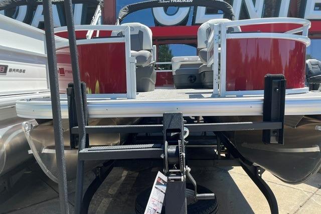 2026 Sun Tracker Bass Buggy 16 XL Select pontoon boat on trailer, rear view.