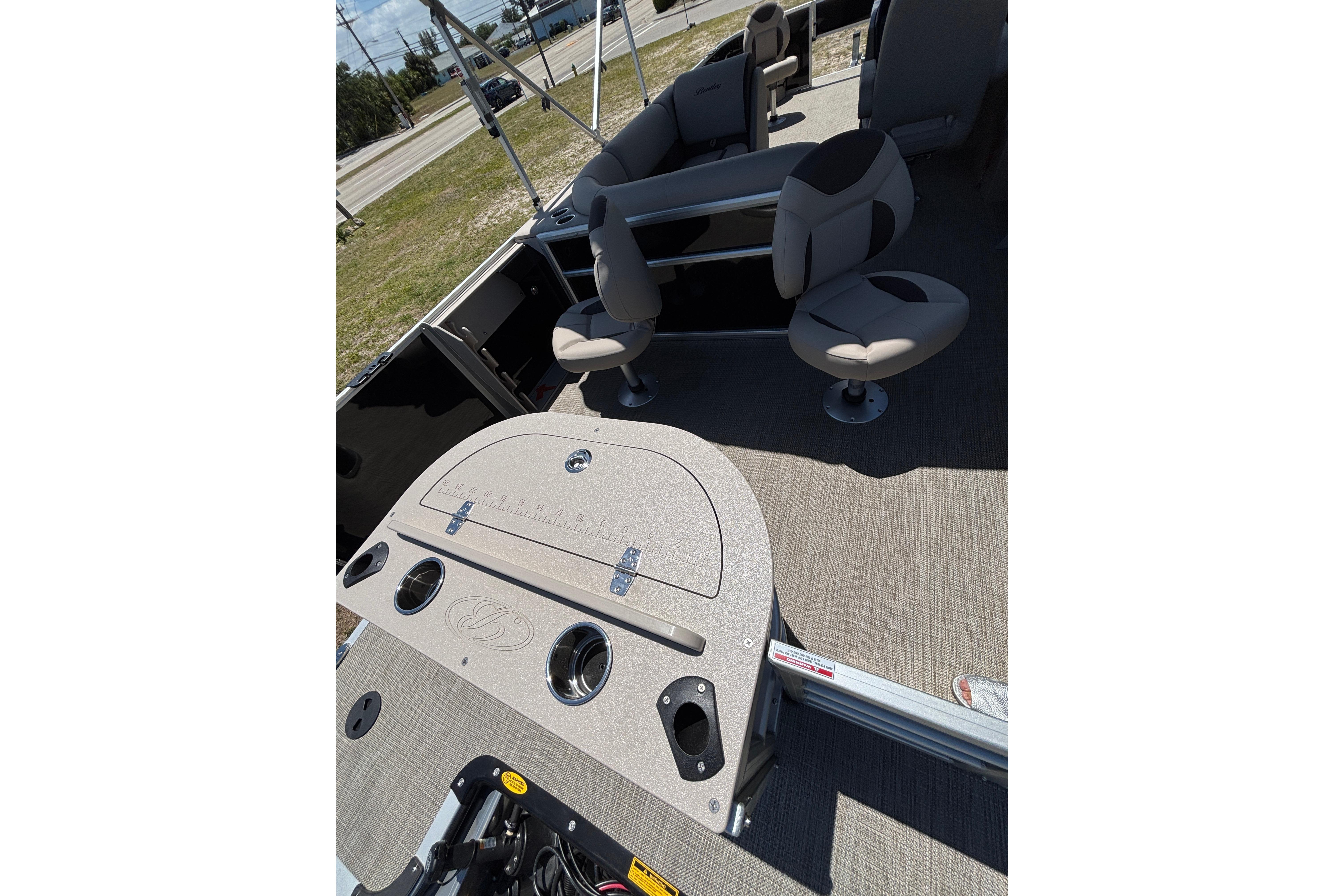 Interior of 2026 Bentley Pontoons Fish 243 4-Point with seating area.
