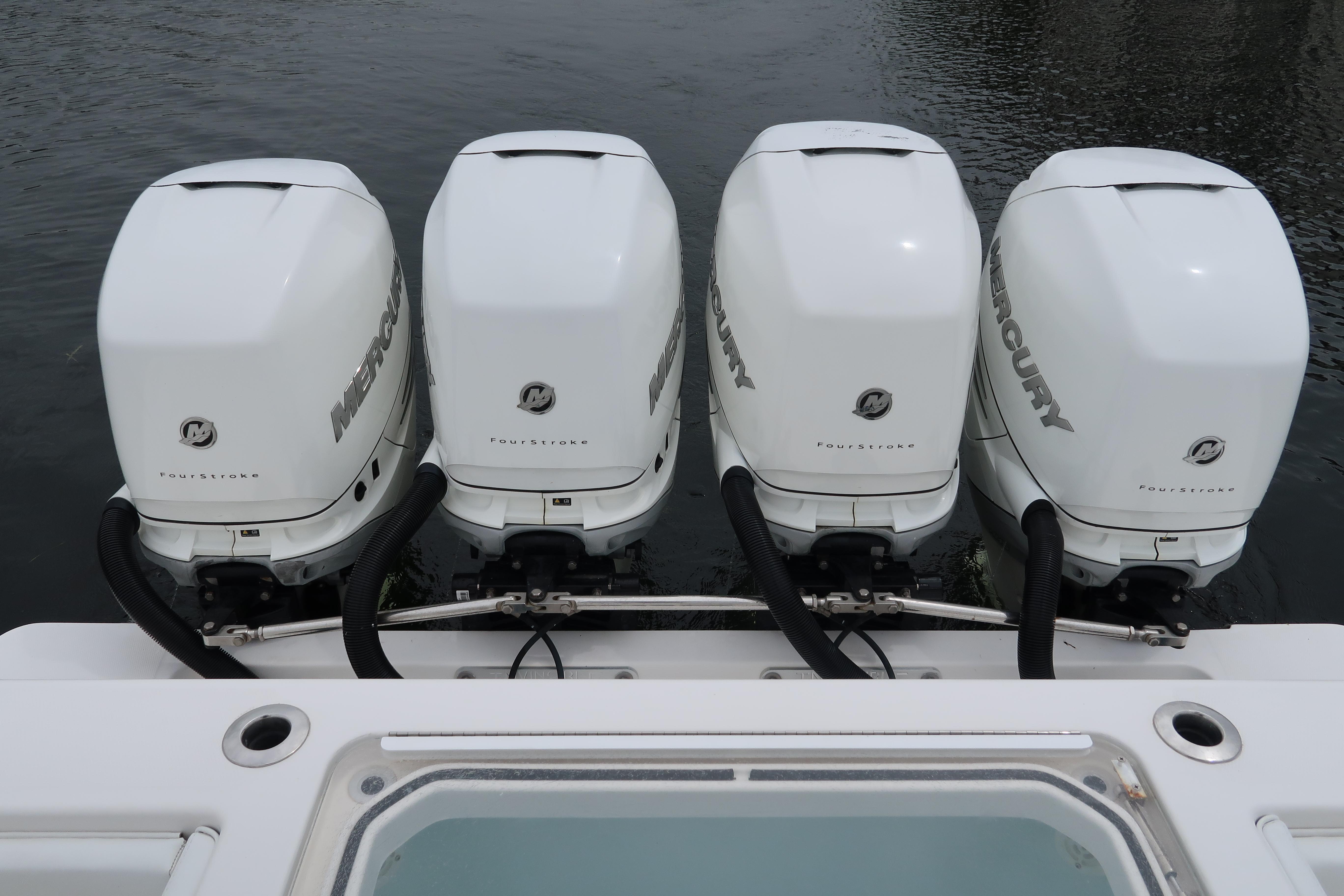 Four Mercury outboard engines on a 2016 Invincible 42 Open Fisherman boat.