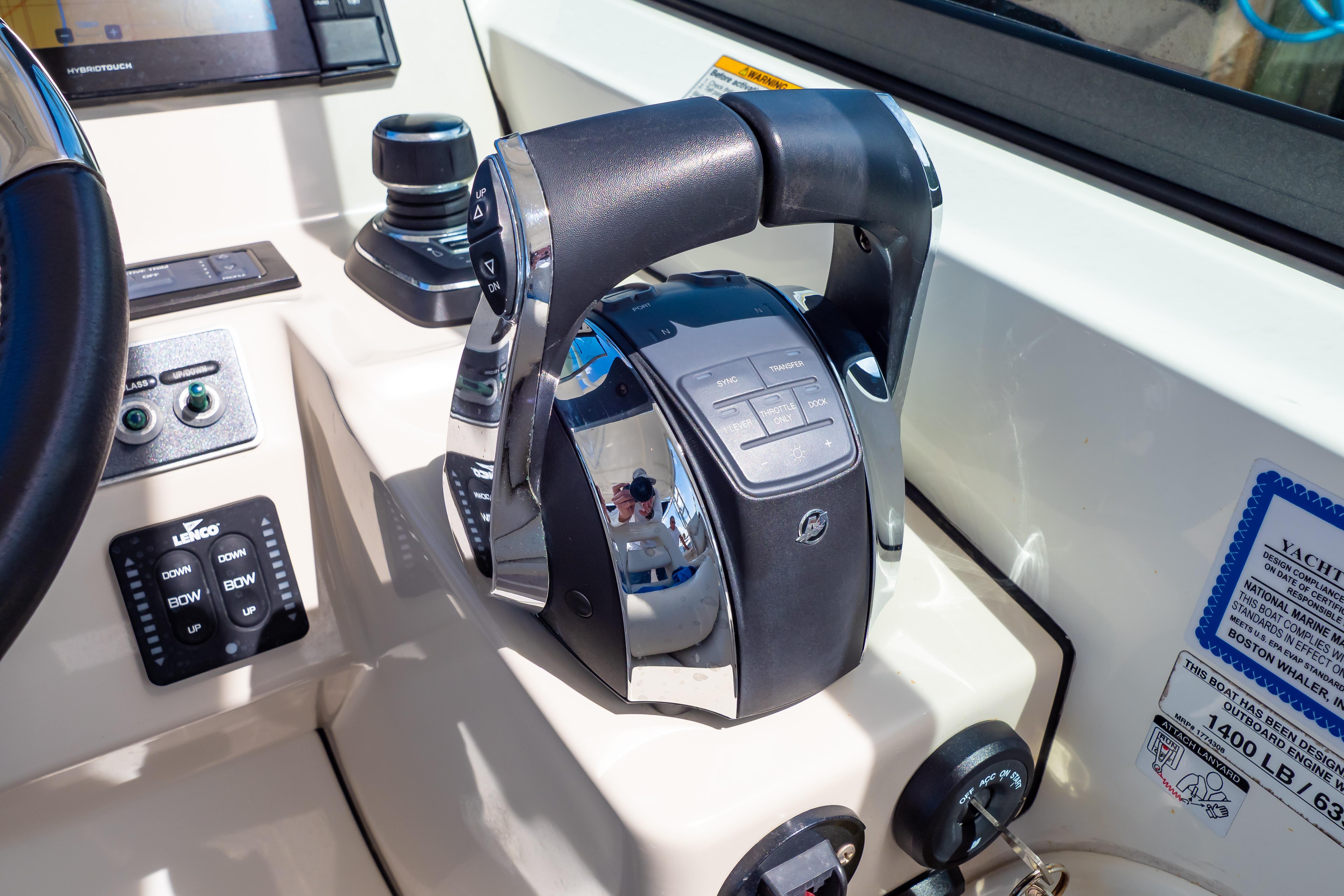Control panel of a 2019 Boston Whaler 270 Vantage boat, featuring advanced navigation controls.