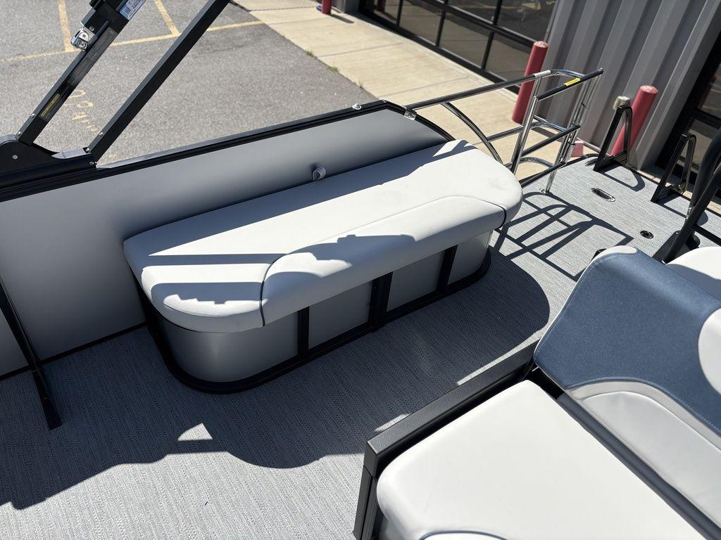 2026 Godfrey SWEETWATER 2286 SFL boat interior with white seating and ladder.