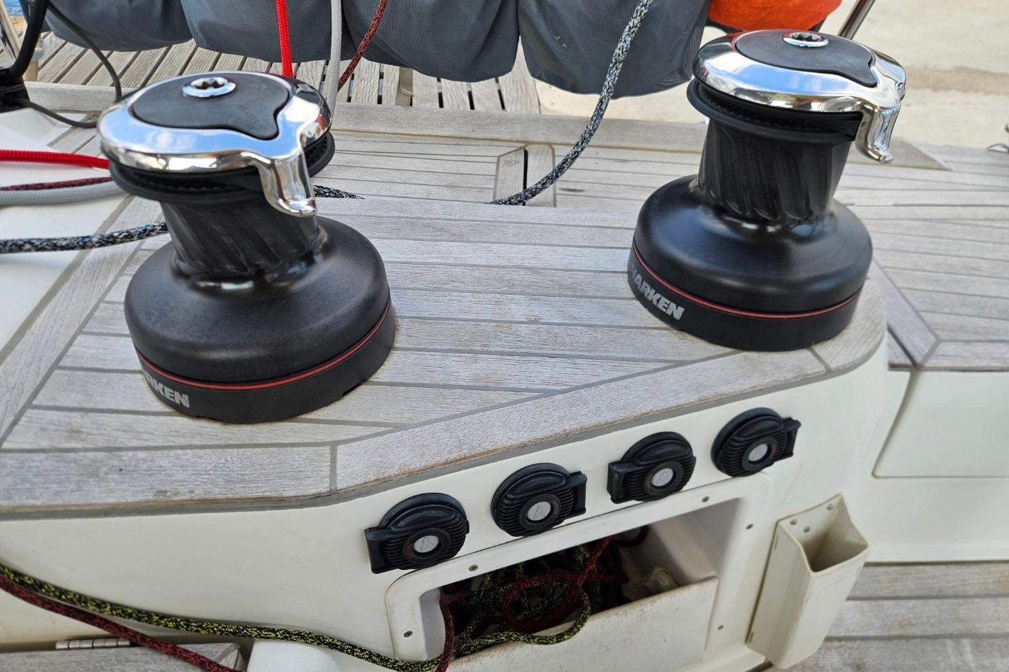 Deck of 2013 CNB BORDEAUX 60 yacht with winches and control panels.