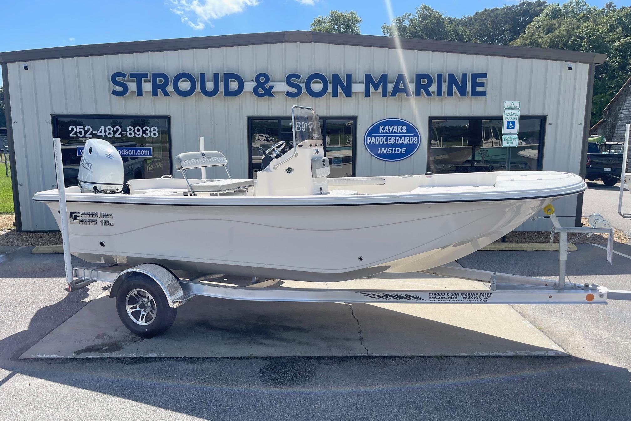 2026 Carolina Skiff 19 LS boat on trailer at Stroud & Son Marine dealership.