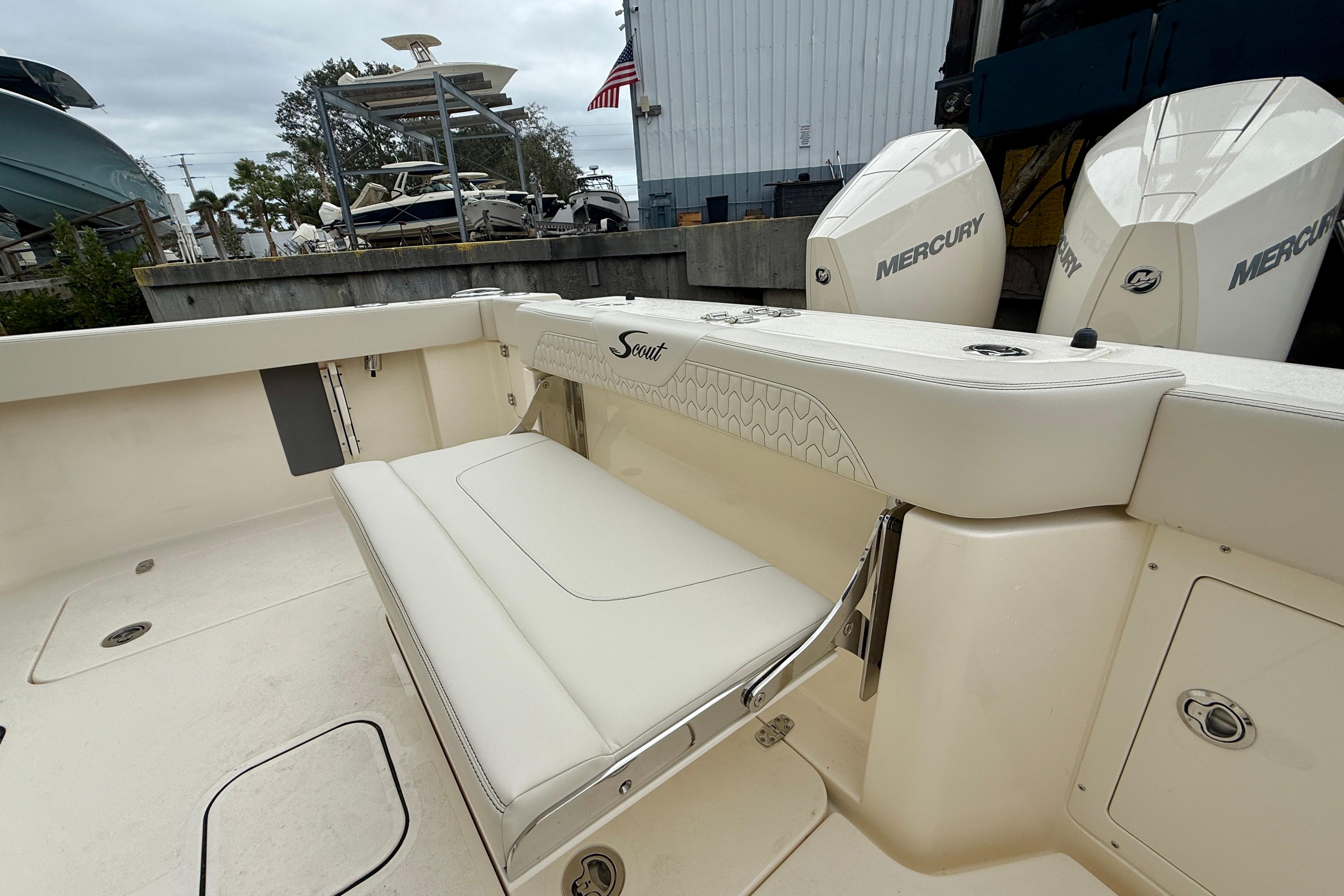 2026 Scout 288 LXF boat interior with seating and Mercury engines.