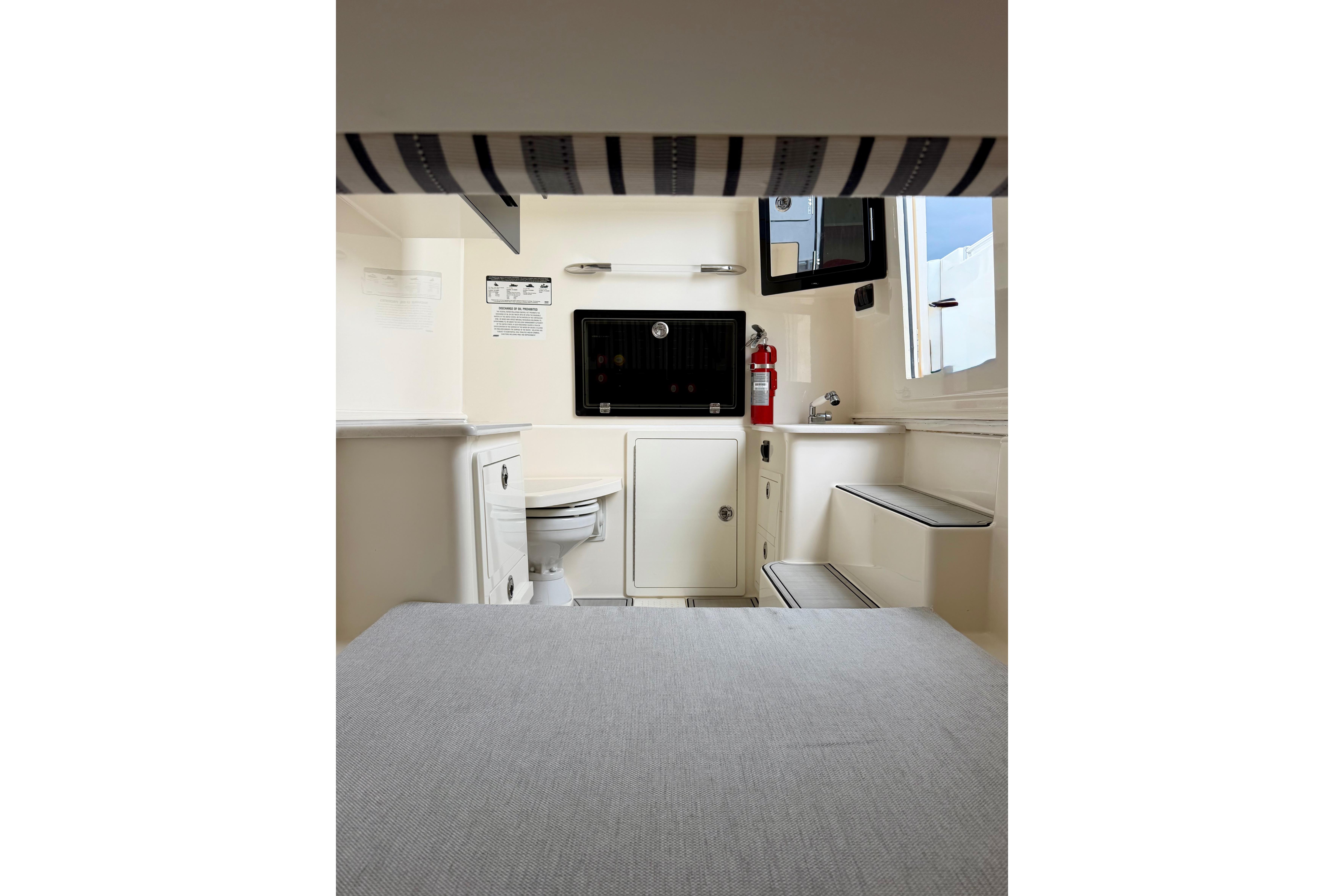 Interior of 2023 Cobia 350 Center Console boat with modern amenities.