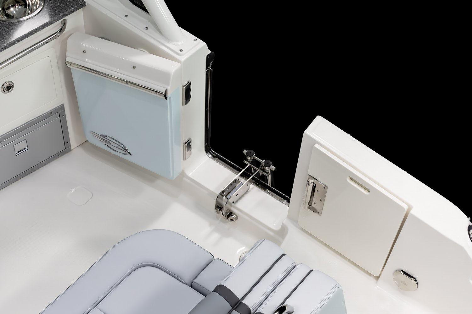 Manufacturer Provided Image: 2025 Chaparral 280 OSX boat interior, featuring sleek seating and storage compartments.